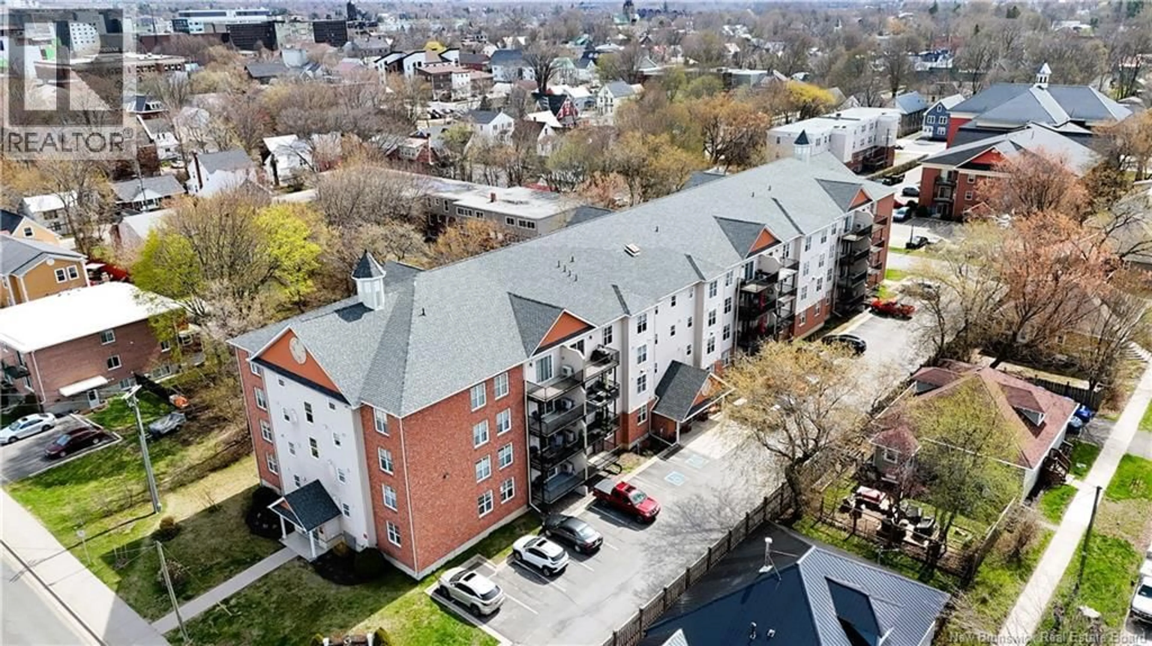 A pic from outside/outdoor area/front of a property/back of a property/a pic from drone, city buildings view from balcony for 202 - 362 CARLETON STREET, Fredericton New Brunswick E3B0C8