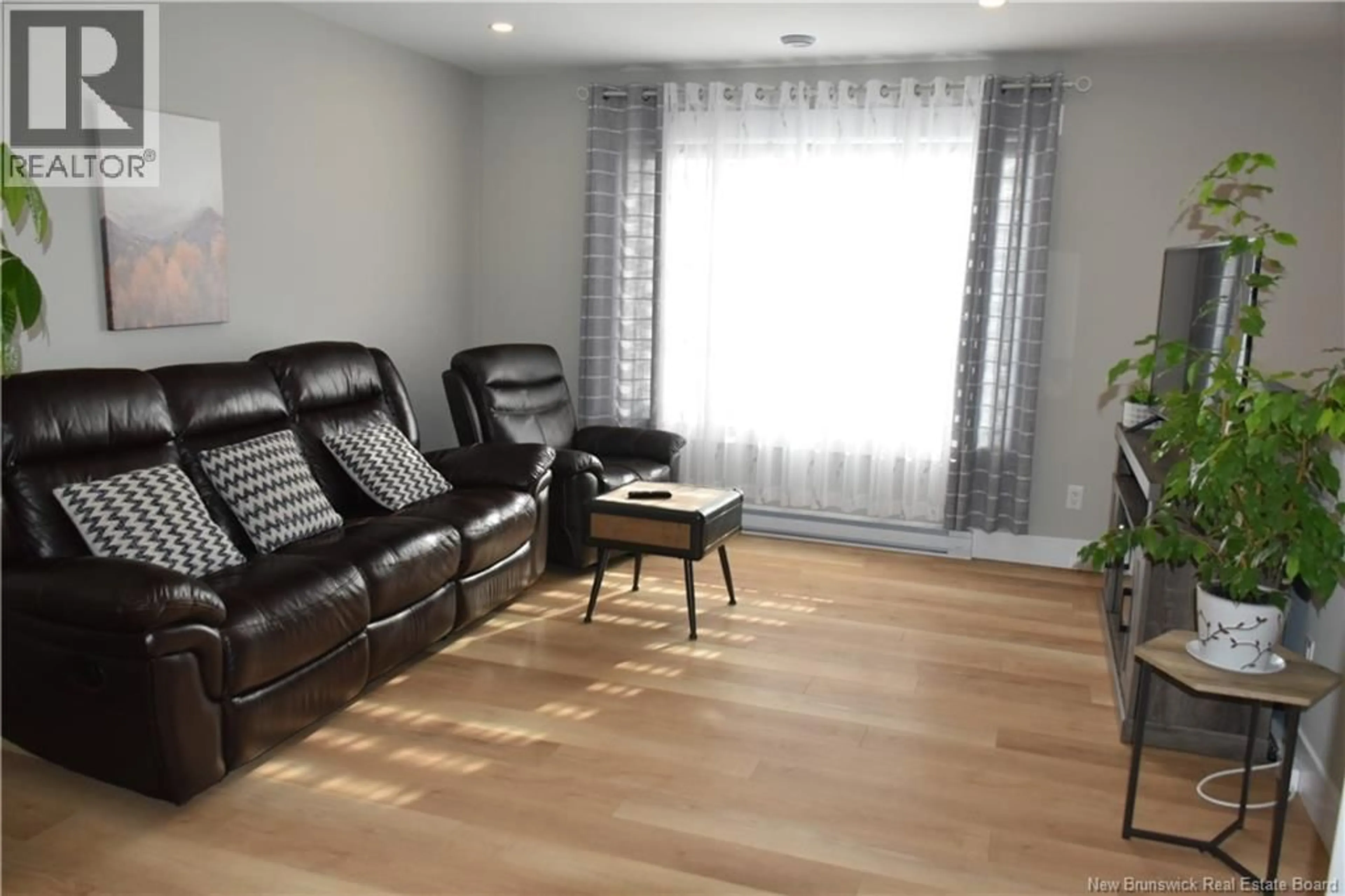 Living room with furniture, wood/laminate floor for 22 MIA STREET, Shediac New Brunswick E4P0Z8