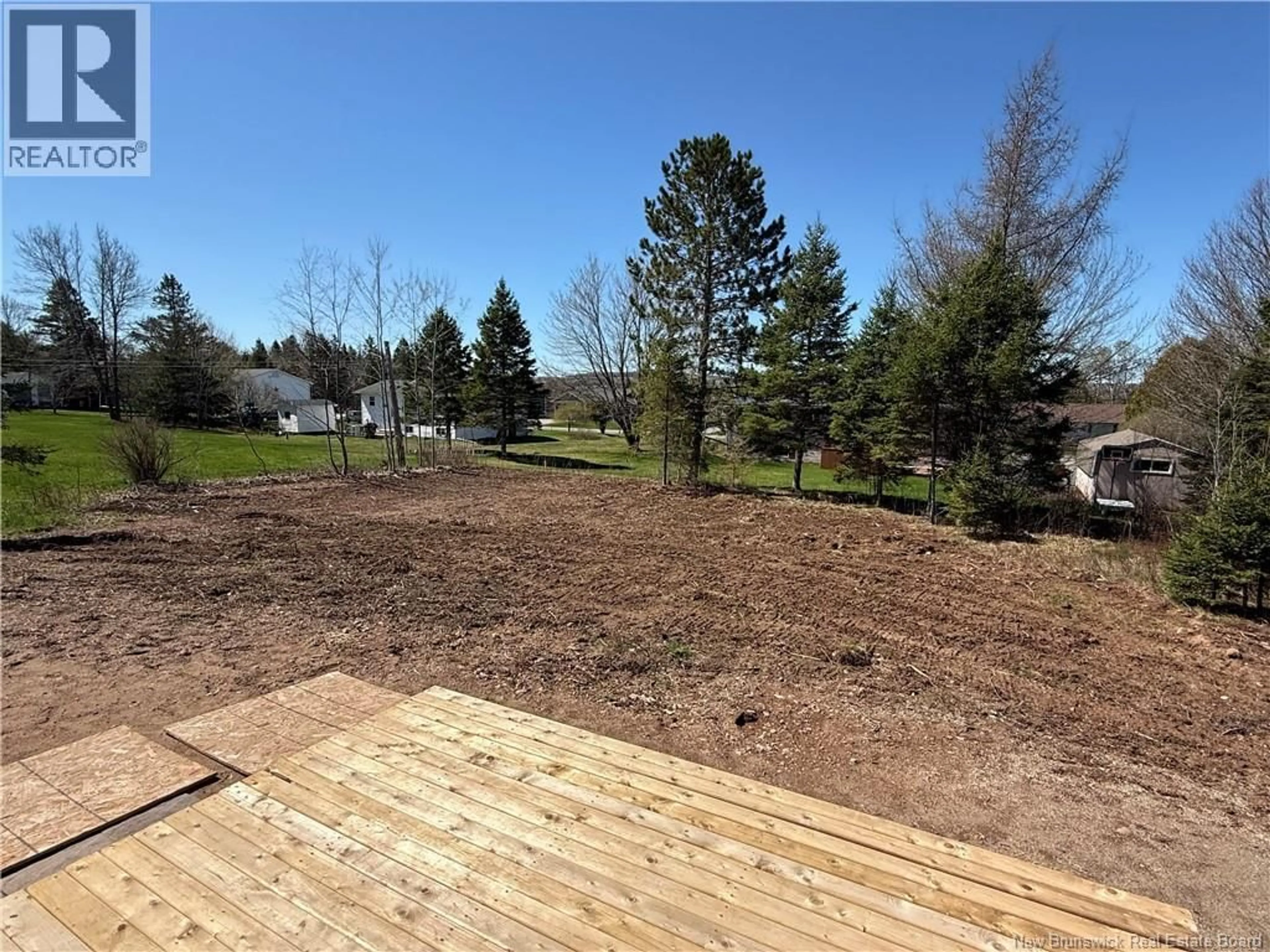 A pic from outside/outdoor area/front of a property/back of a property/a pic from drone, forest/trees view for 54 COUGLE ROAD, Sussex Corner New Brunswick E4E2S6