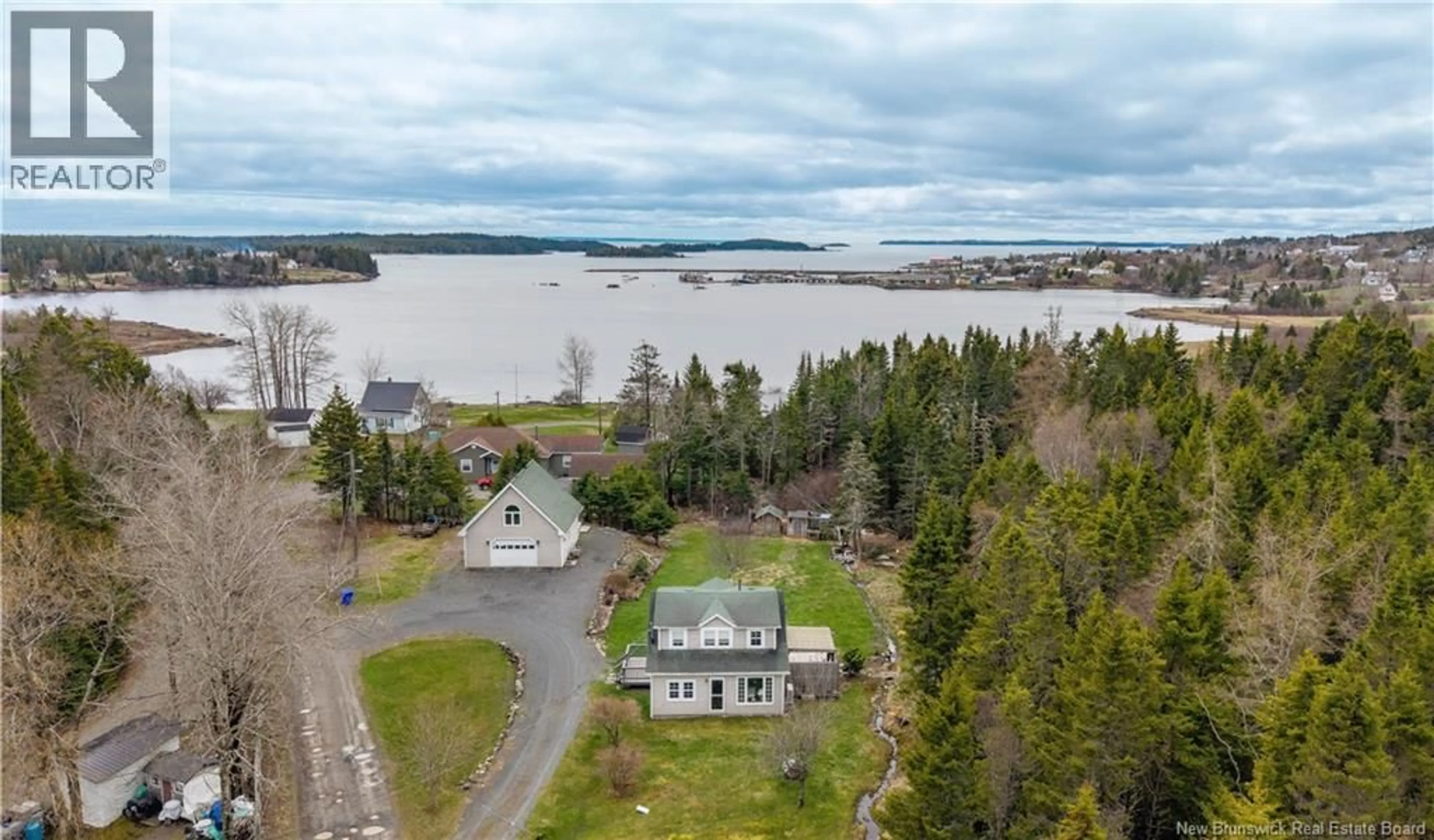 A pic from outside/outdoor area/front of a property/back of a property/a pic from drone, water/lake/river/ocean view for 10 STANLEY OLIVER ROAD, Back Bay New Brunswick E5C1Z4