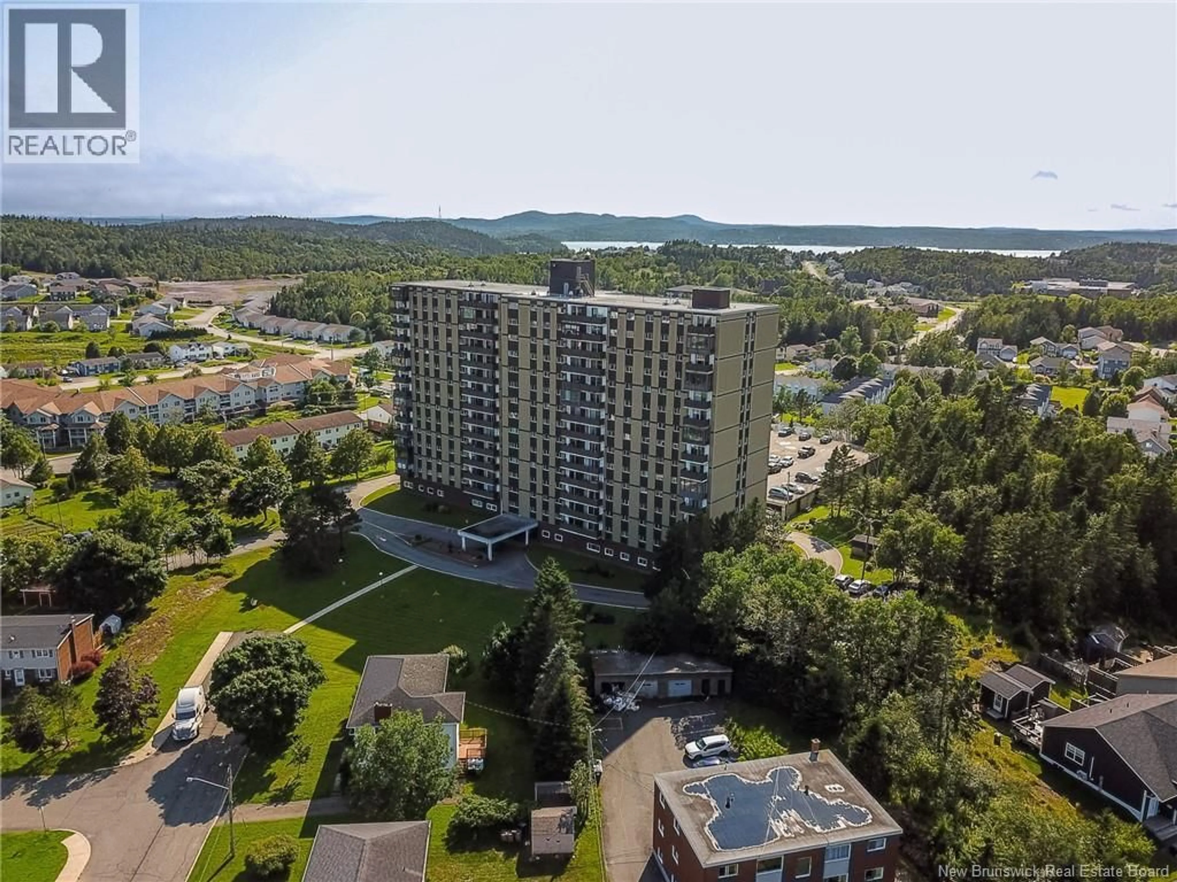 A pic from outside/outdoor area/front of a property/back of a property/a pic from drone, unknown for 511 - 310 WOODWARD AVENUE, Saint John New Brunswick E2K2L1