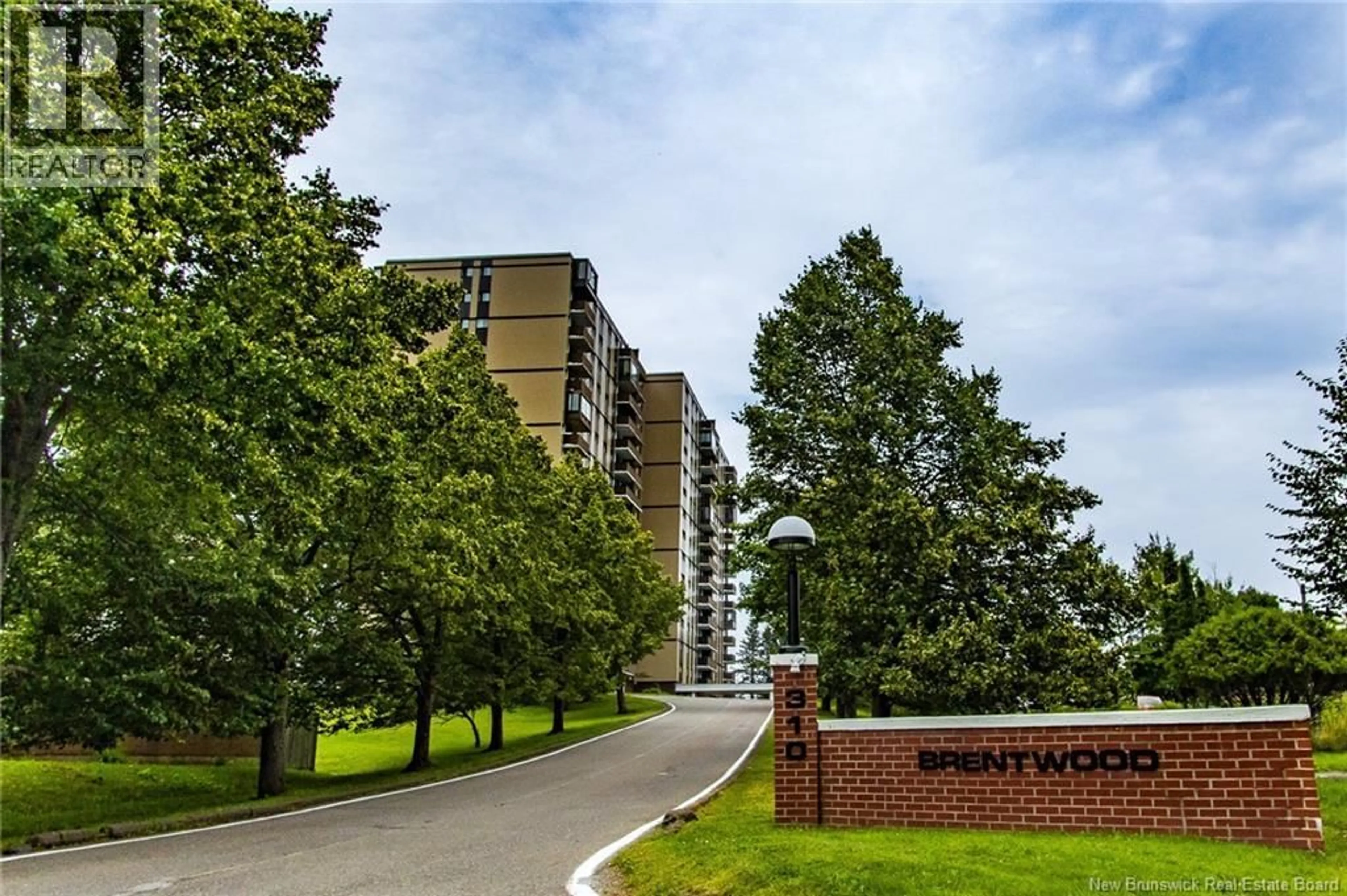 A pic from outside/outdoor area/front of a property/back of a property/a pic from drone, unknown for 511 - 310 WOODWARD AVENUE, Saint John New Brunswick E2K2L1