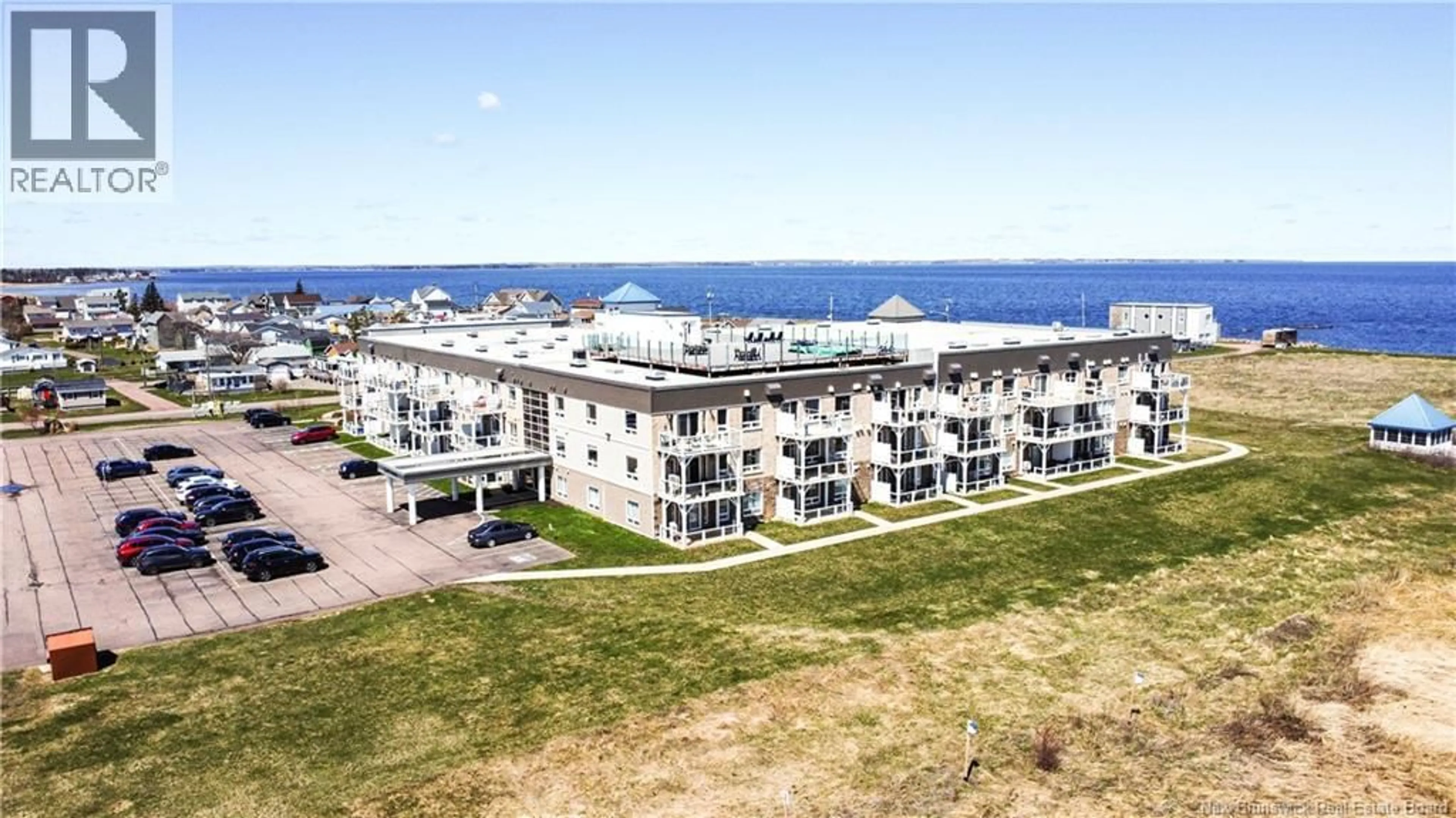 A pic from outside/outdoor area/front of a property/back of a property/a pic from drone, water/lake/river/ocean view for 111 - 69 CAP BIMET BOULEVARD, Grand-Barachois New Brunswick E4P6X5