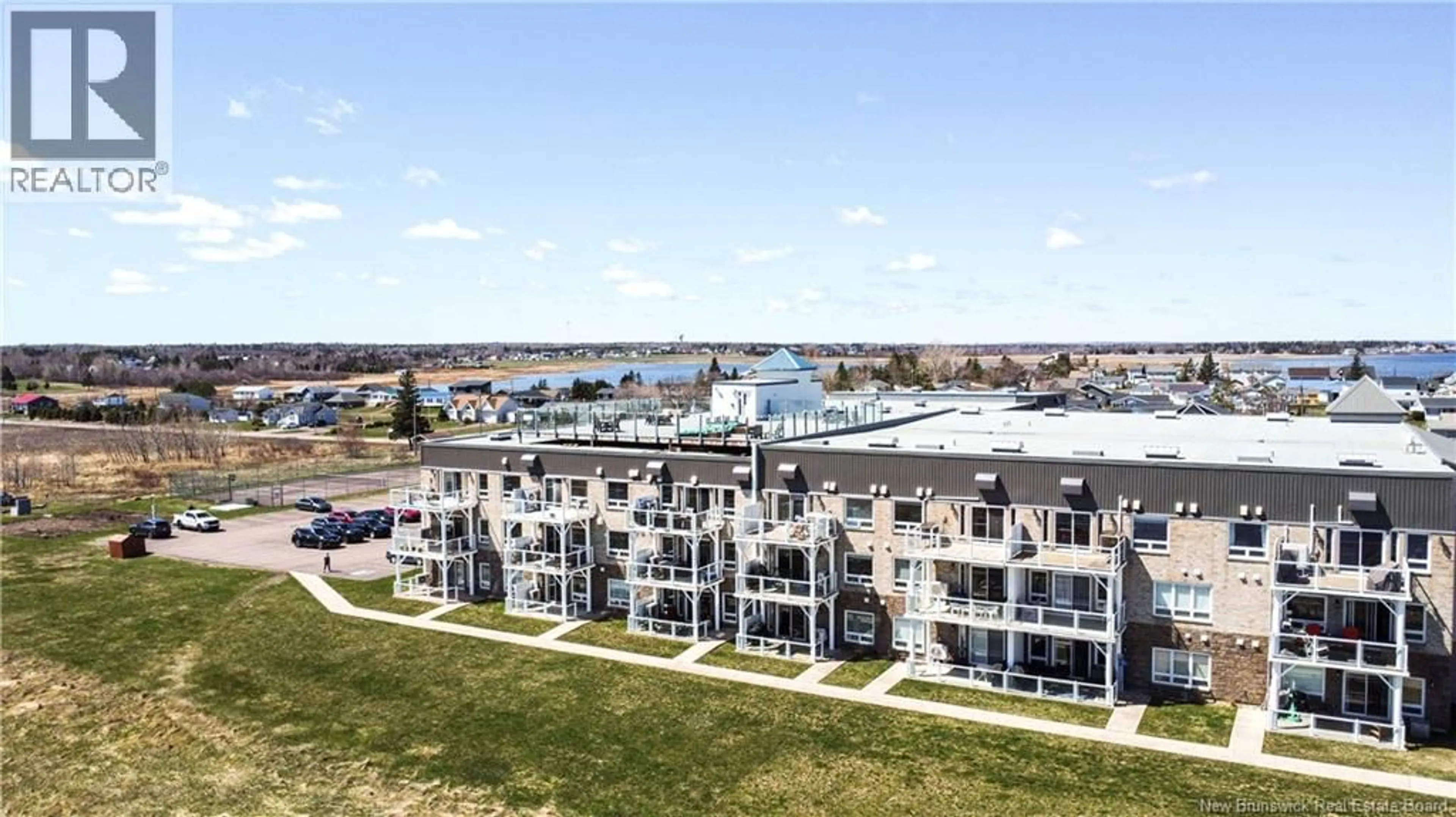 A pic from outside/outdoor area/front of a property/back of a property/a pic from drone, city buildings view from balcony for 111 - 69 CAP BIMET BOULEVARD, Grand-Barachois New Brunswick E4P6X5