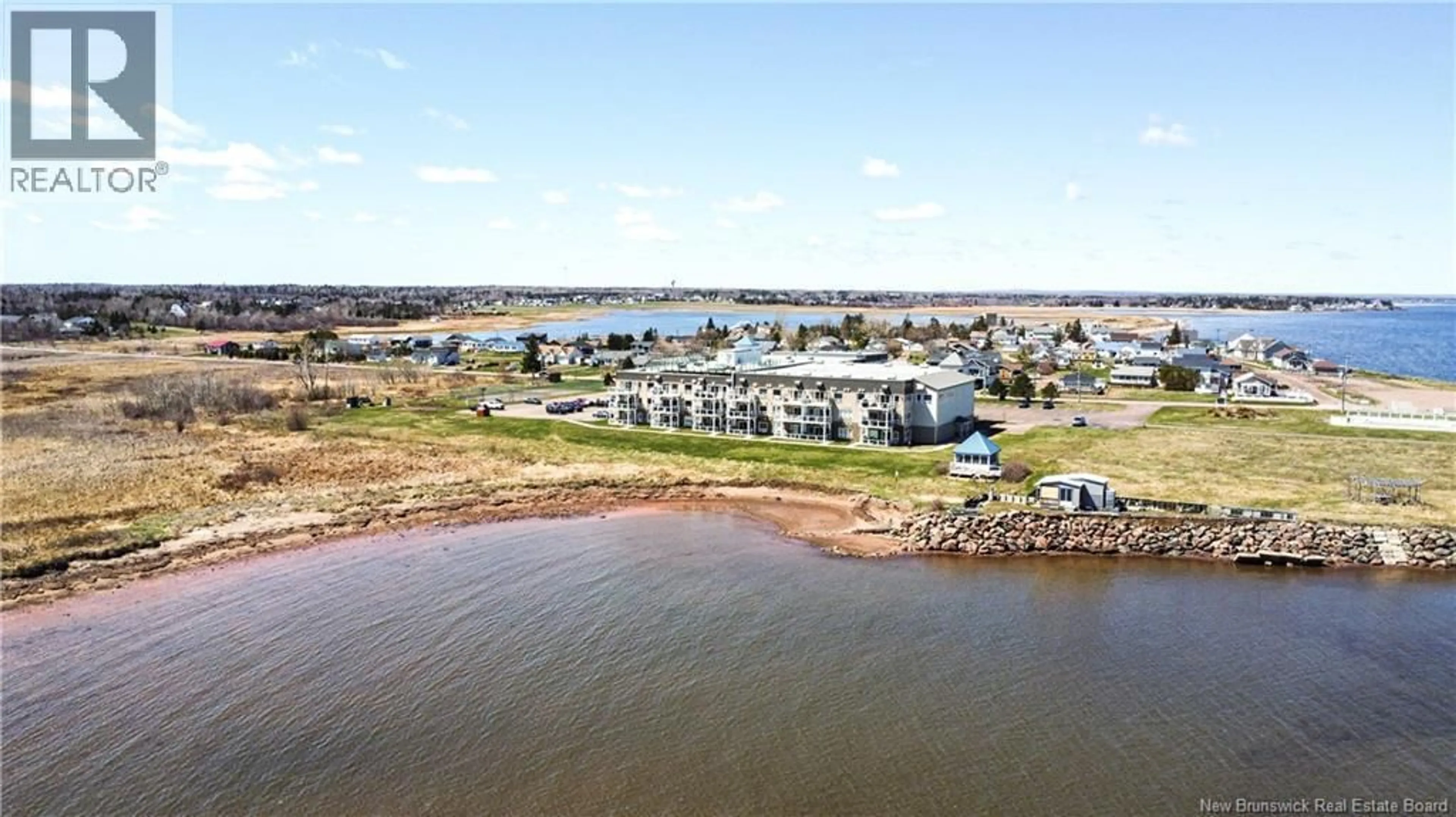 A pic from outside/outdoor area/front of a property/back of a property/a pic from drone, water/lake/river/ocean view for 111 - 69 CAP BIMET BOULEVARD, Grand-Barachois New Brunswick E4P6X5