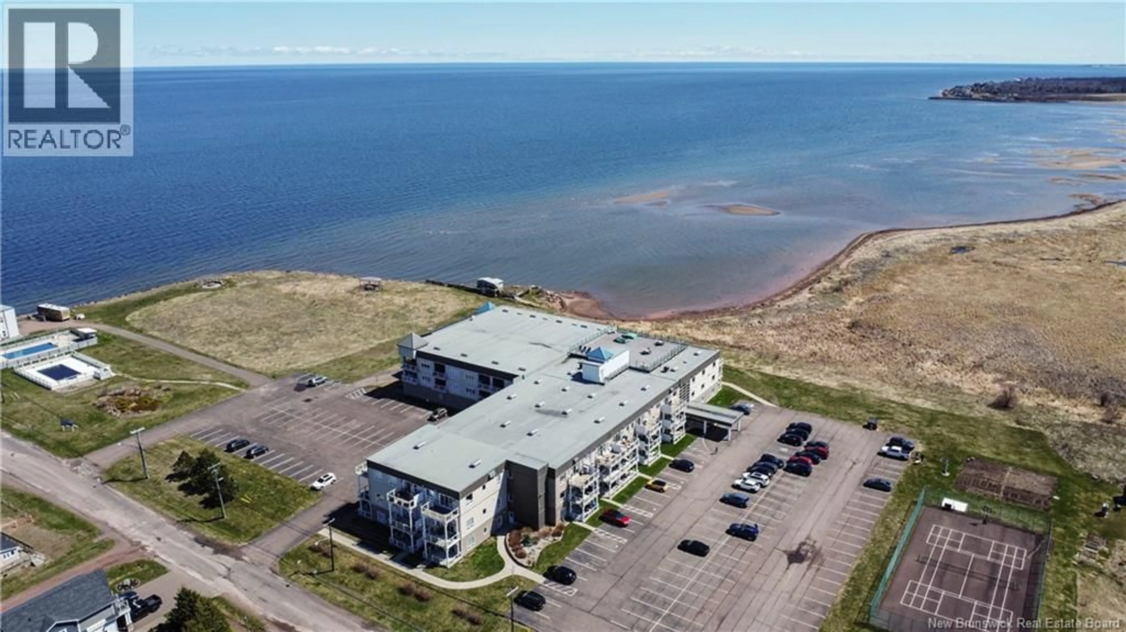 A pic from outside/outdoor area/front of a property/back of a property/a pic from drone, water/lake/river/ocean view for 111 - 69 CAP BIMET BOULEVARD, Grand-Barachois New Brunswick E4P6X5