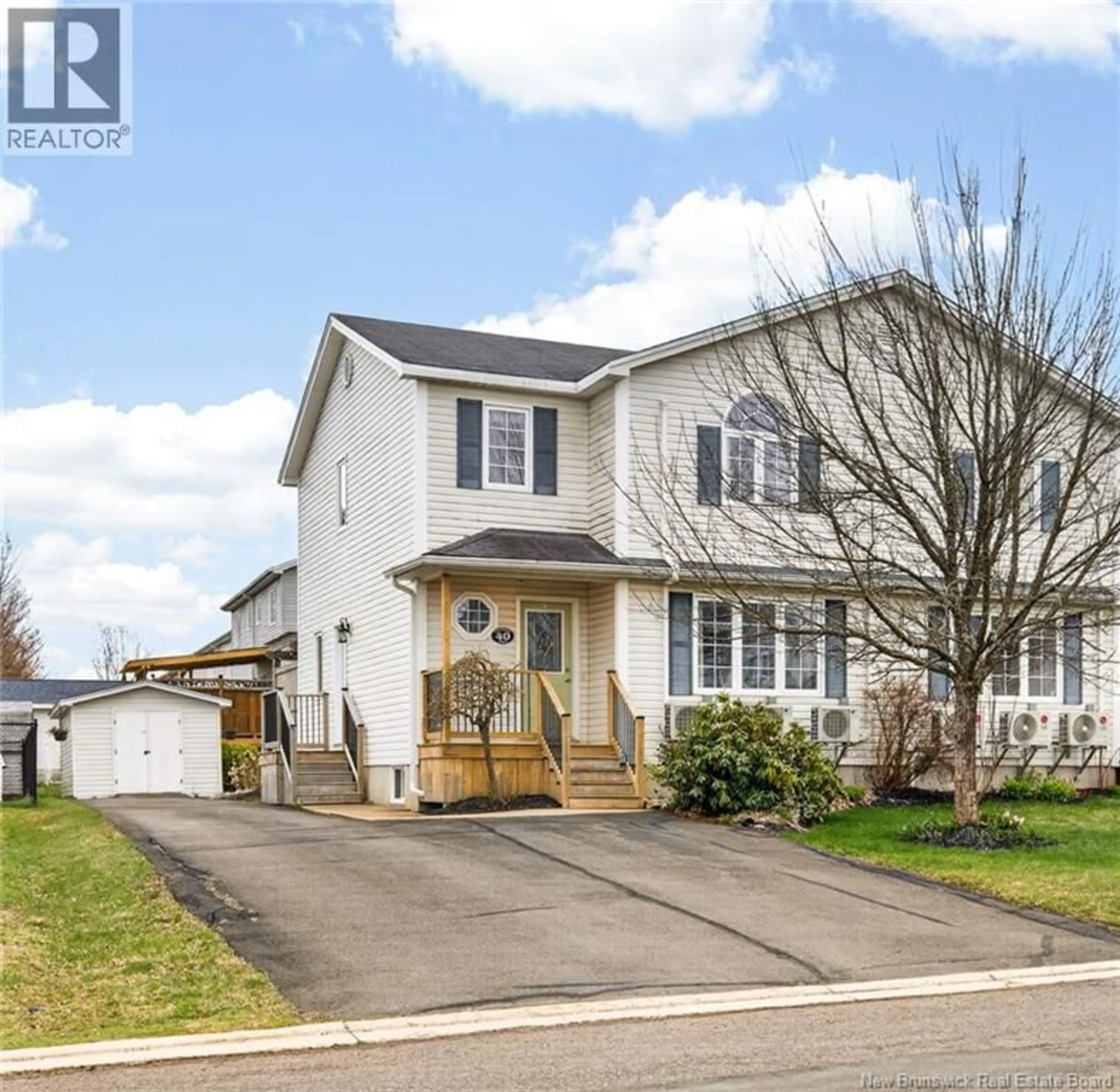 Home with vinyl exterior material, street for 40 STONEHAM DRIVE, Moncton New Brunswick E1G4Z6