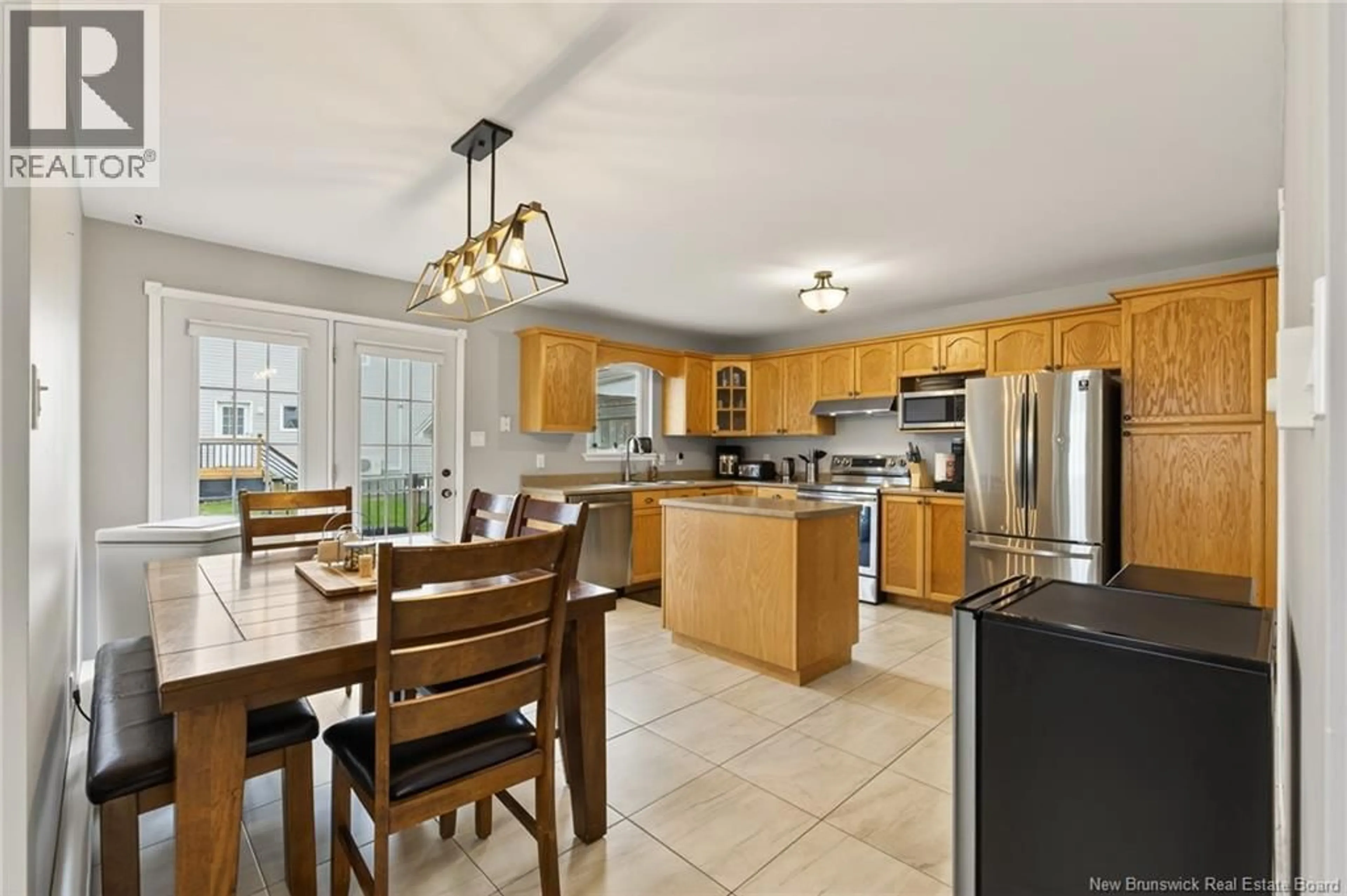 Open concept kitchen, ceramic/tile floor for 40 STONEHAM DRIVE, Moncton New Brunswick E1G4Z6