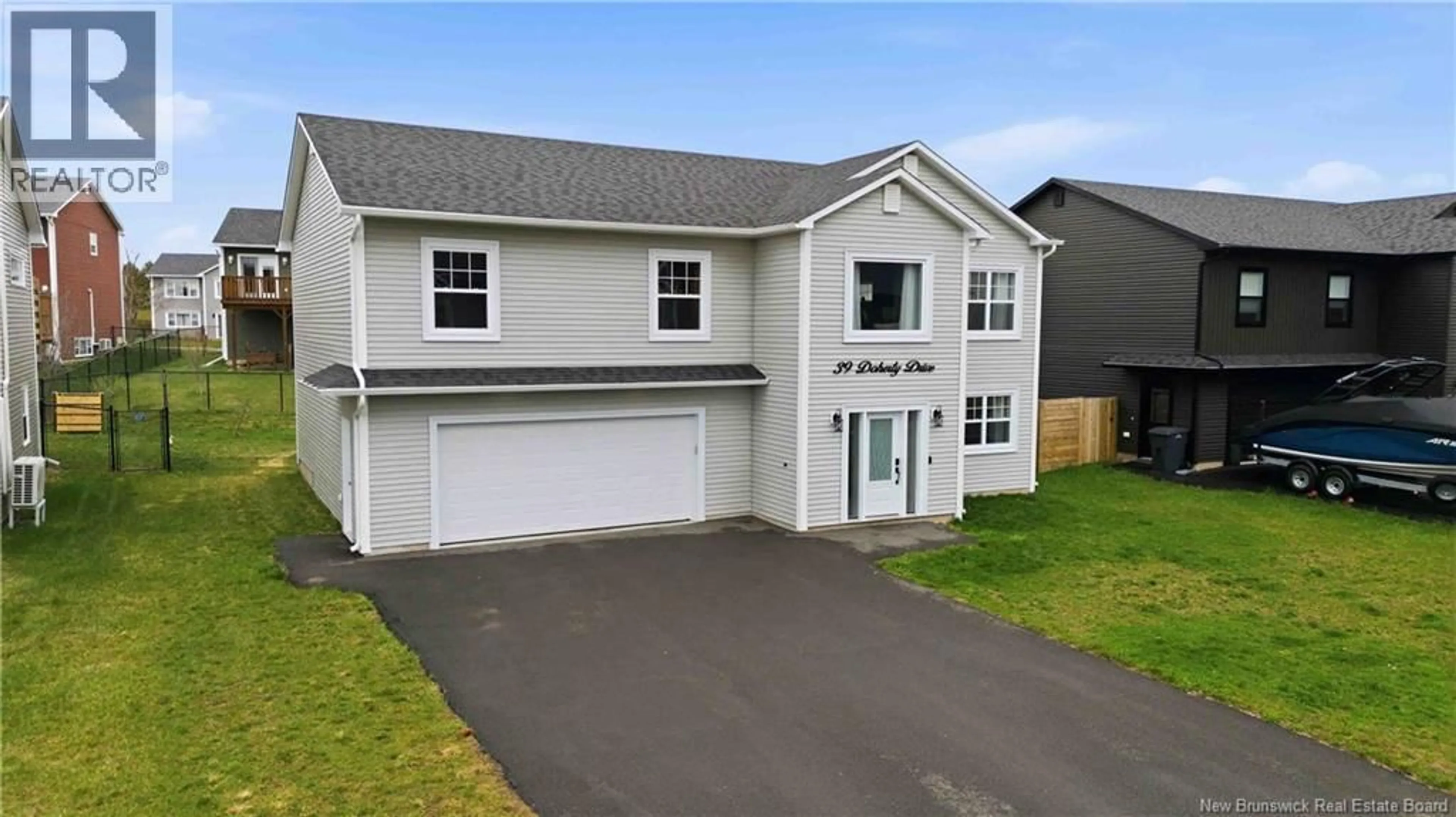 Home with vinyl exterior material, street for 39 DOHERTY DRIVE, Oromocto New Brunswick E2V0M7