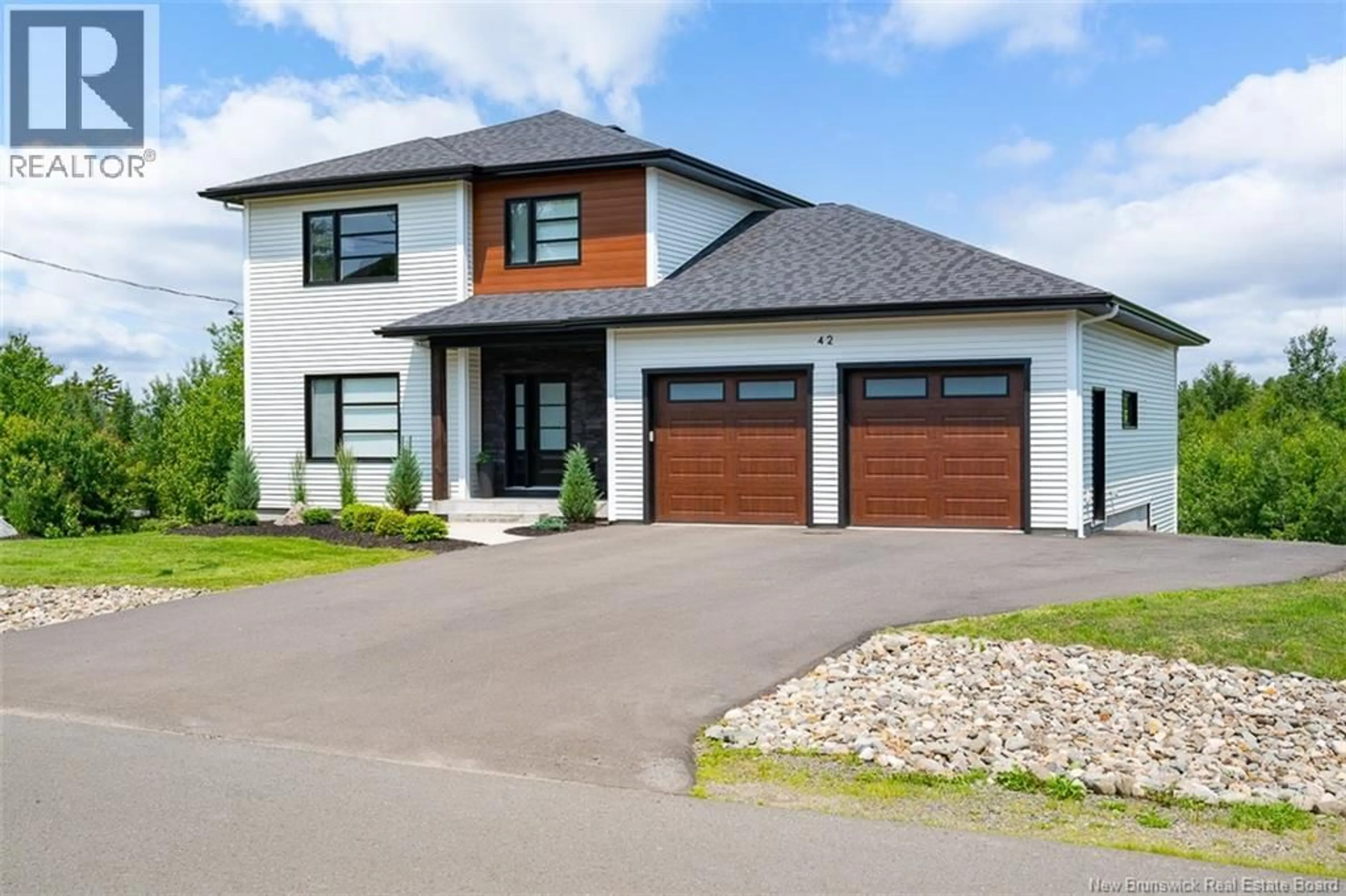 Home with vinyl exterior material, street for 42 GOLDEN EAGLE DRIVE, Hanwell New Brunswick E3C0H3