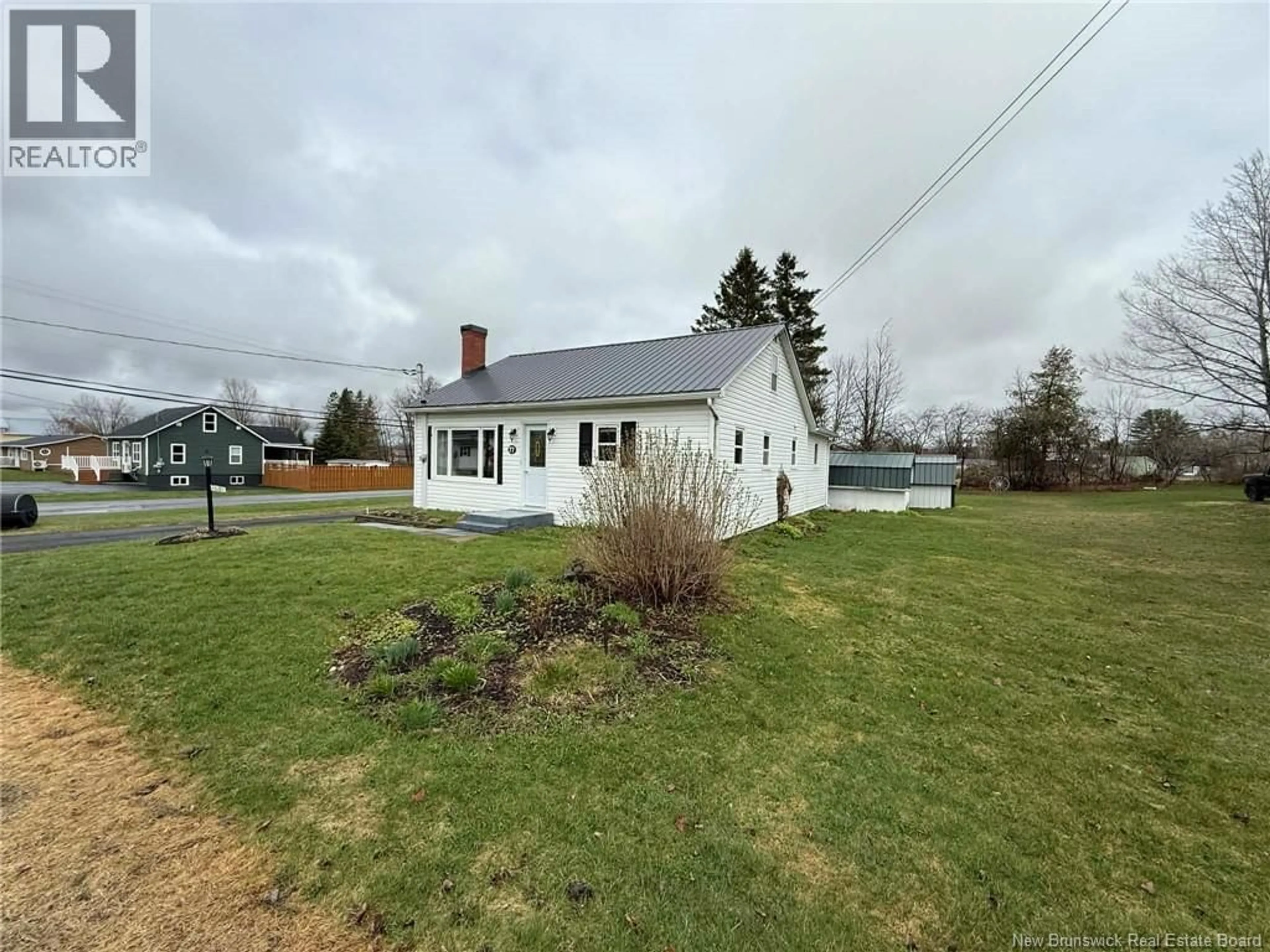 A pic from outside/outdoor area/front of a property/back of a property/a pic from drone, water/lake/river/ocean view for 77 HILLCREST STREET, Hartland New Brunswick E7P1M9