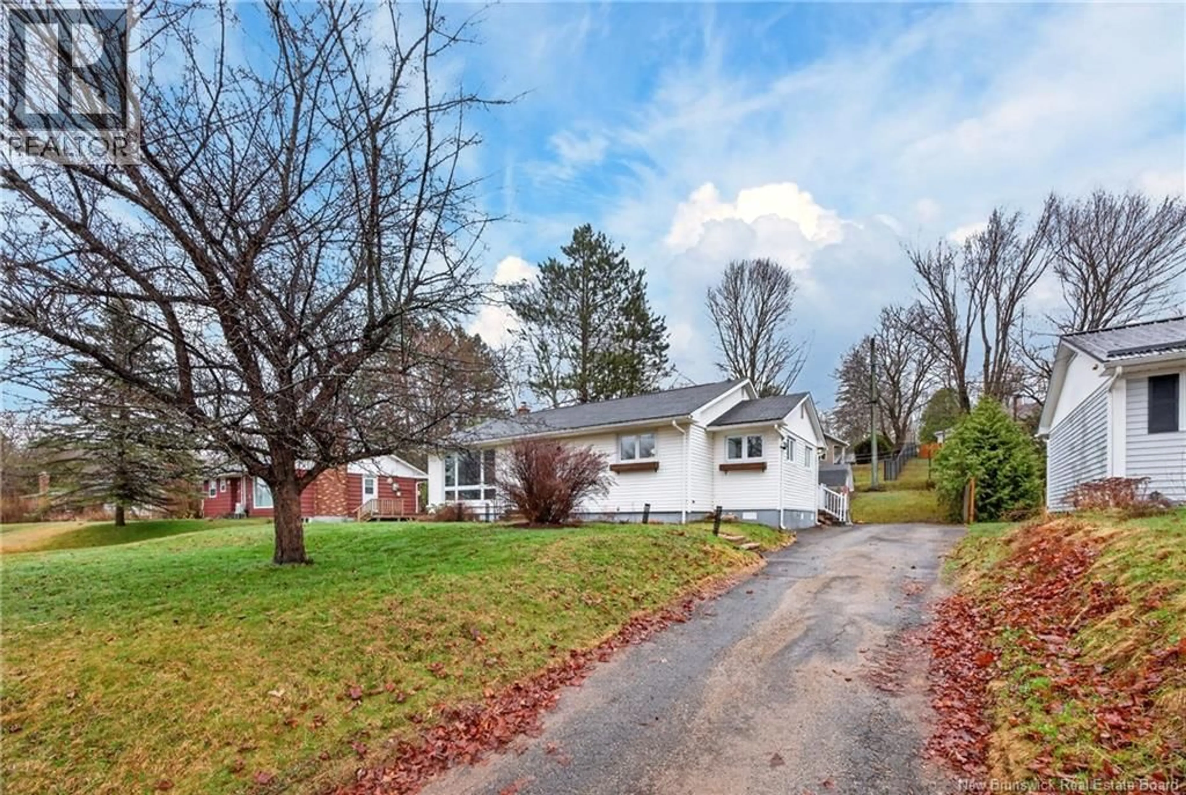 A pic from outside/outdoor area/front of a property/back of a property/a pic from drone, street for 18 BIRCHCROFT DRIVE, Fredericton New Brunswick E3C1K7