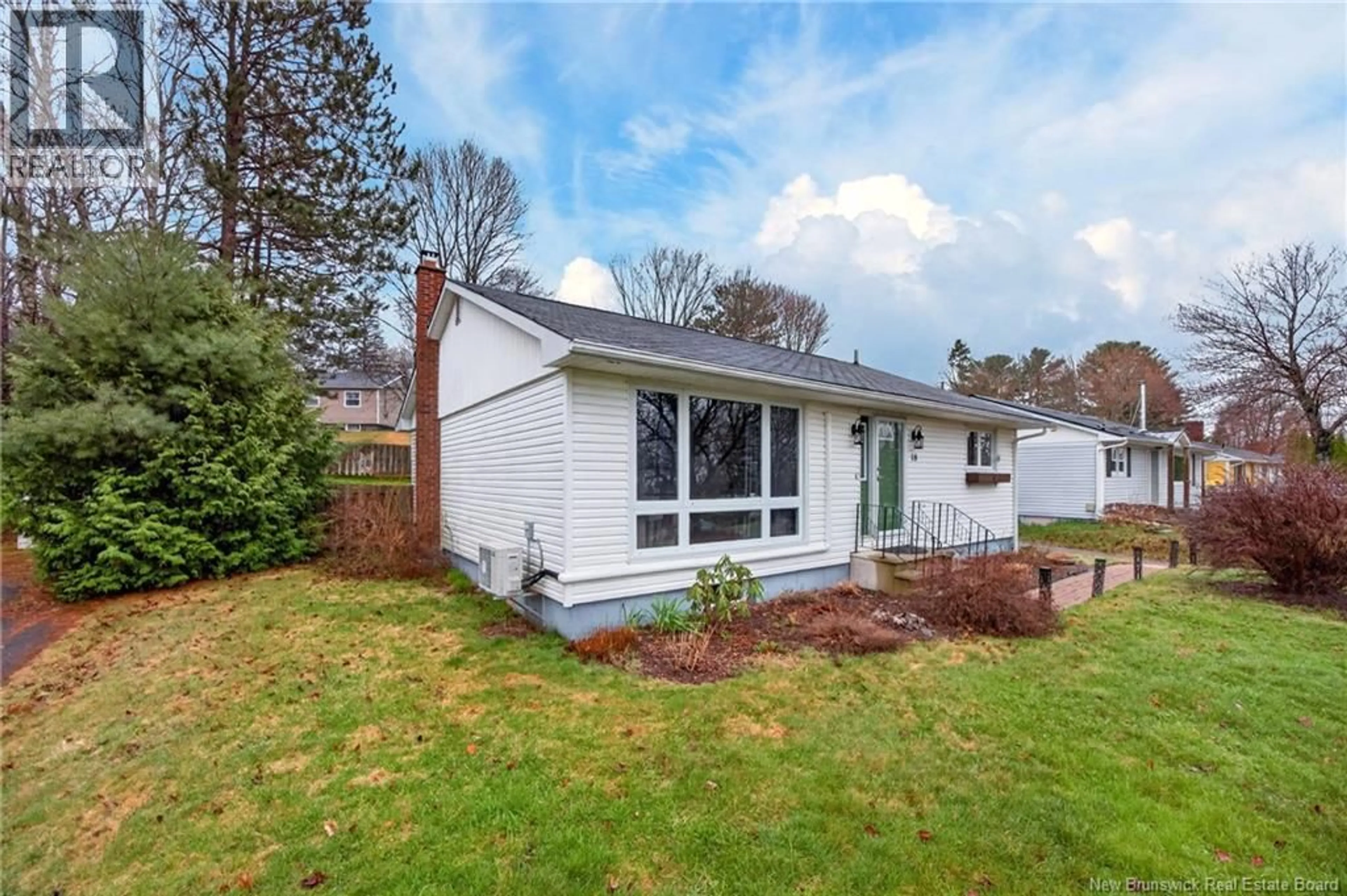 Home with vinyl exterior material, street for 18 BIRCHCROFT DRIVE, Fredericton New Brunswick E3C1K7