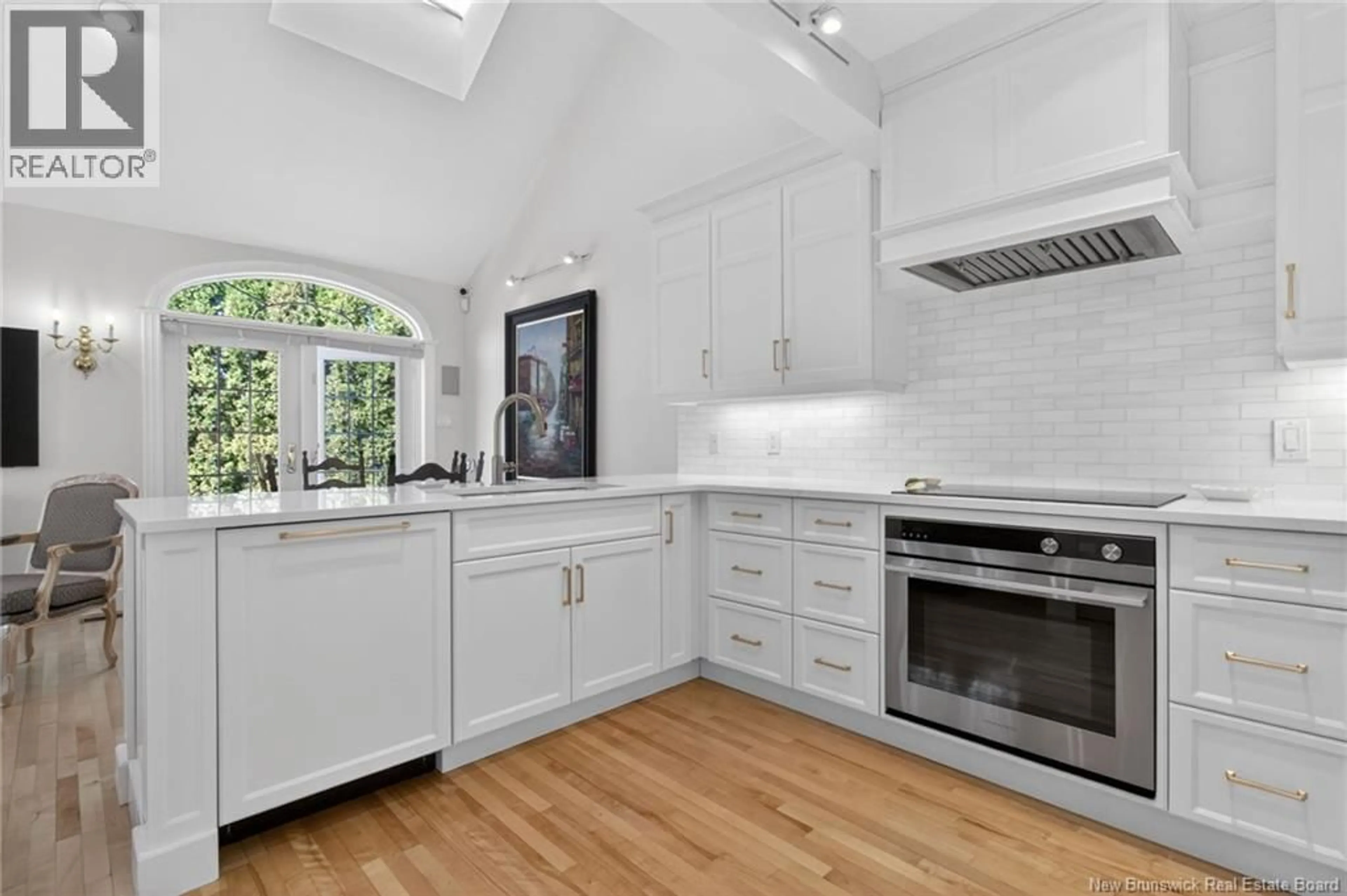 Open concept kitchen, ceramic/tile floor for 146 RUE YVON, Saint-Antoine New Brunswick E4V1L4
