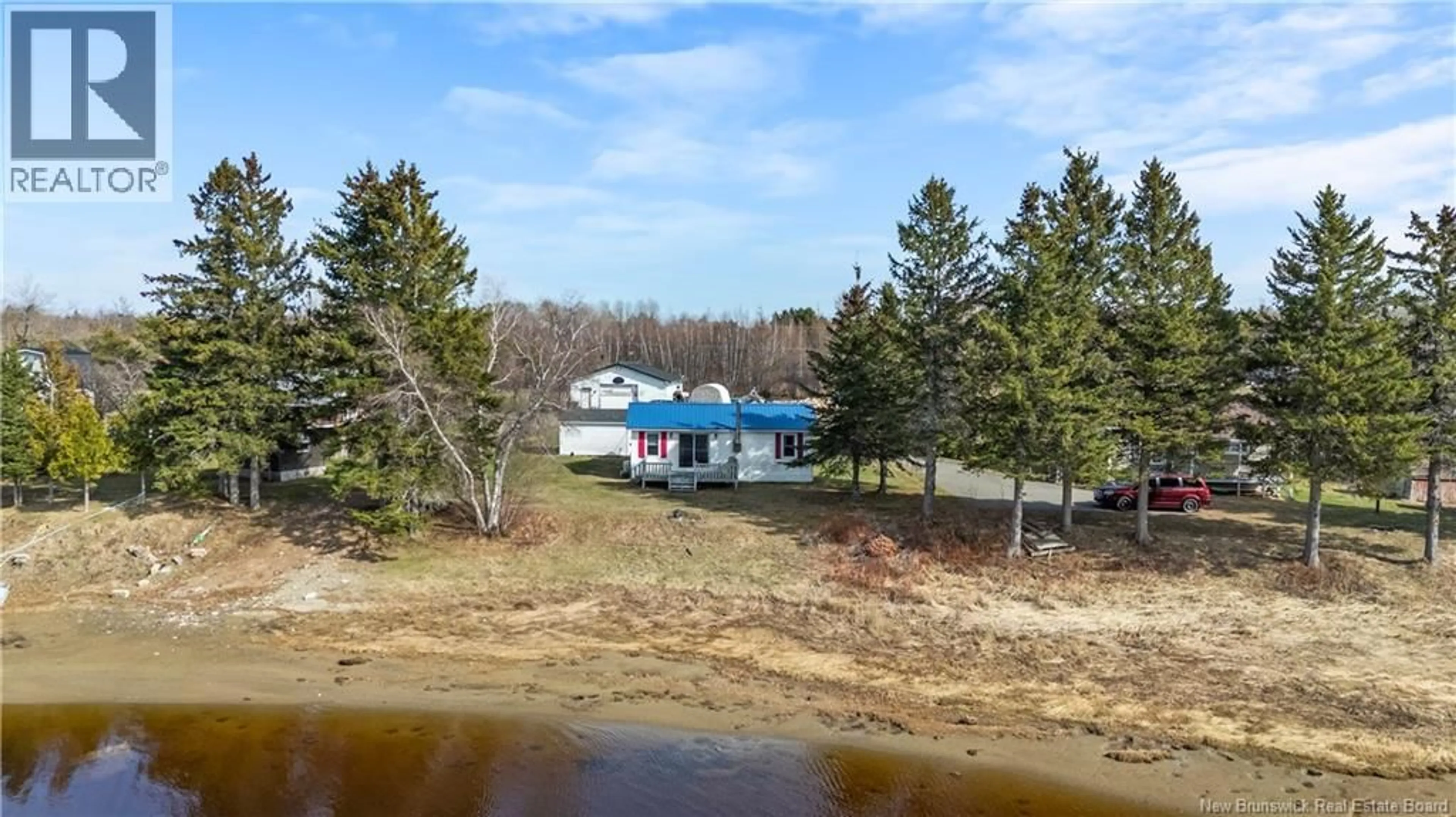 A pic from outside/outdoor area/front of a property/back of a property/a pic from drone, water/lake/river/ocean view for 90 PASCAL, Aldouane New Brunswick E4W5G7