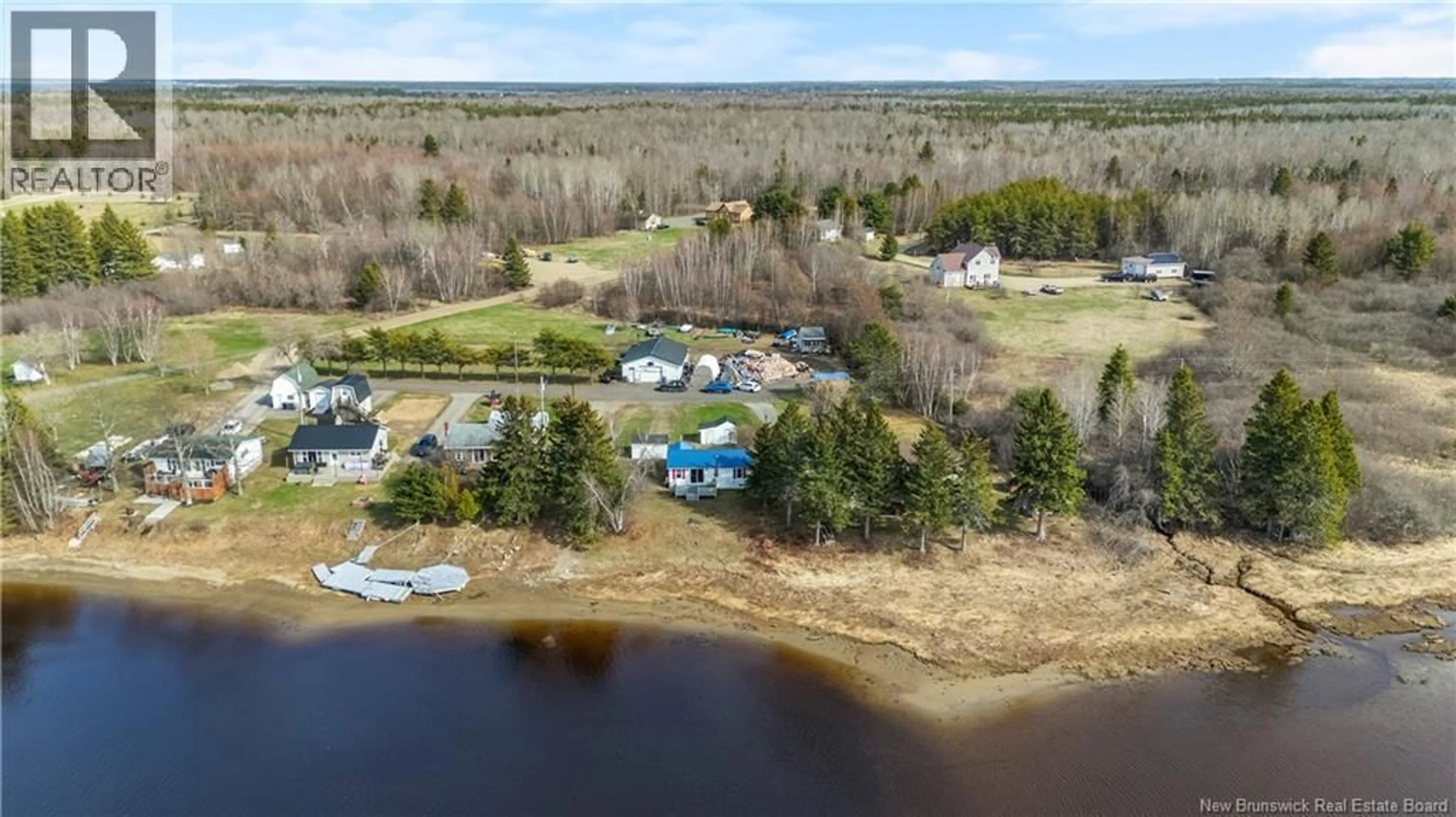 A pic from outside/outdoor area/front of a property/back of a property/a pic from drone, water/lake/river/ocean view for 90 PASCAL, Aldouane New Brunswick E4W5G7