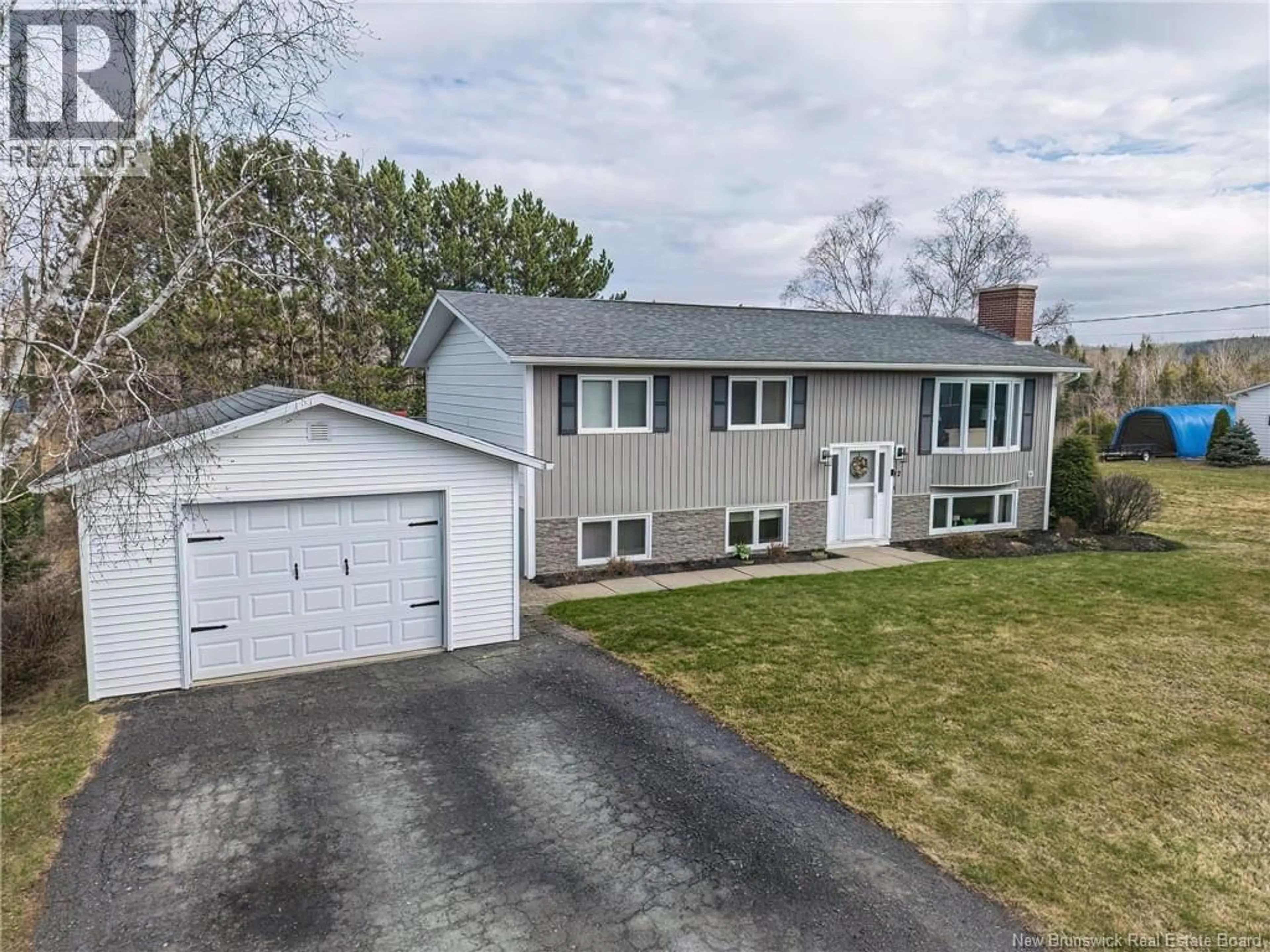 A pic from outside/outdoor area/front of a property/back of a property/a pic from drone, street for 92 HILLCREST DRIVE, Perth-Andover New Brunswick E7H2H2