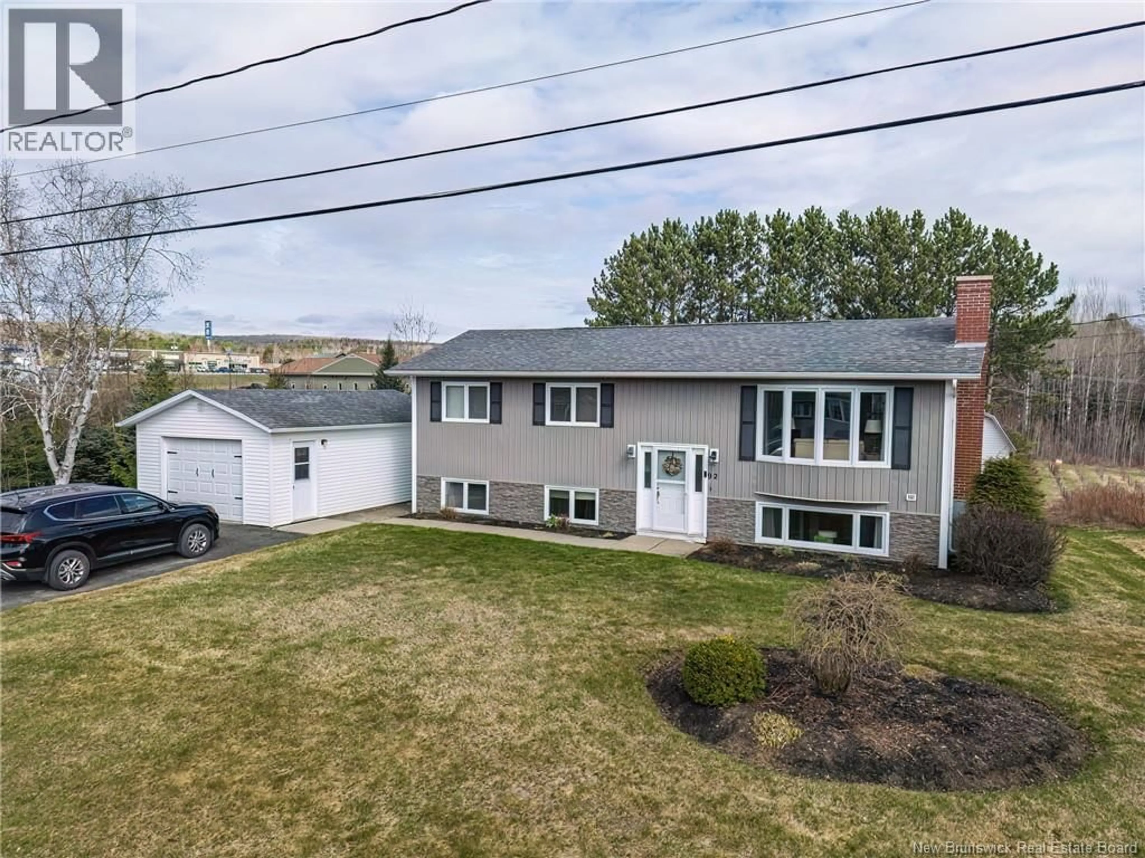 A pic from outside/outdoor area/front of a property/back of a property/a pic from drone, street for 92 HILLCREST DRIVE, Perth-Andover New Brunswick E7H2H2