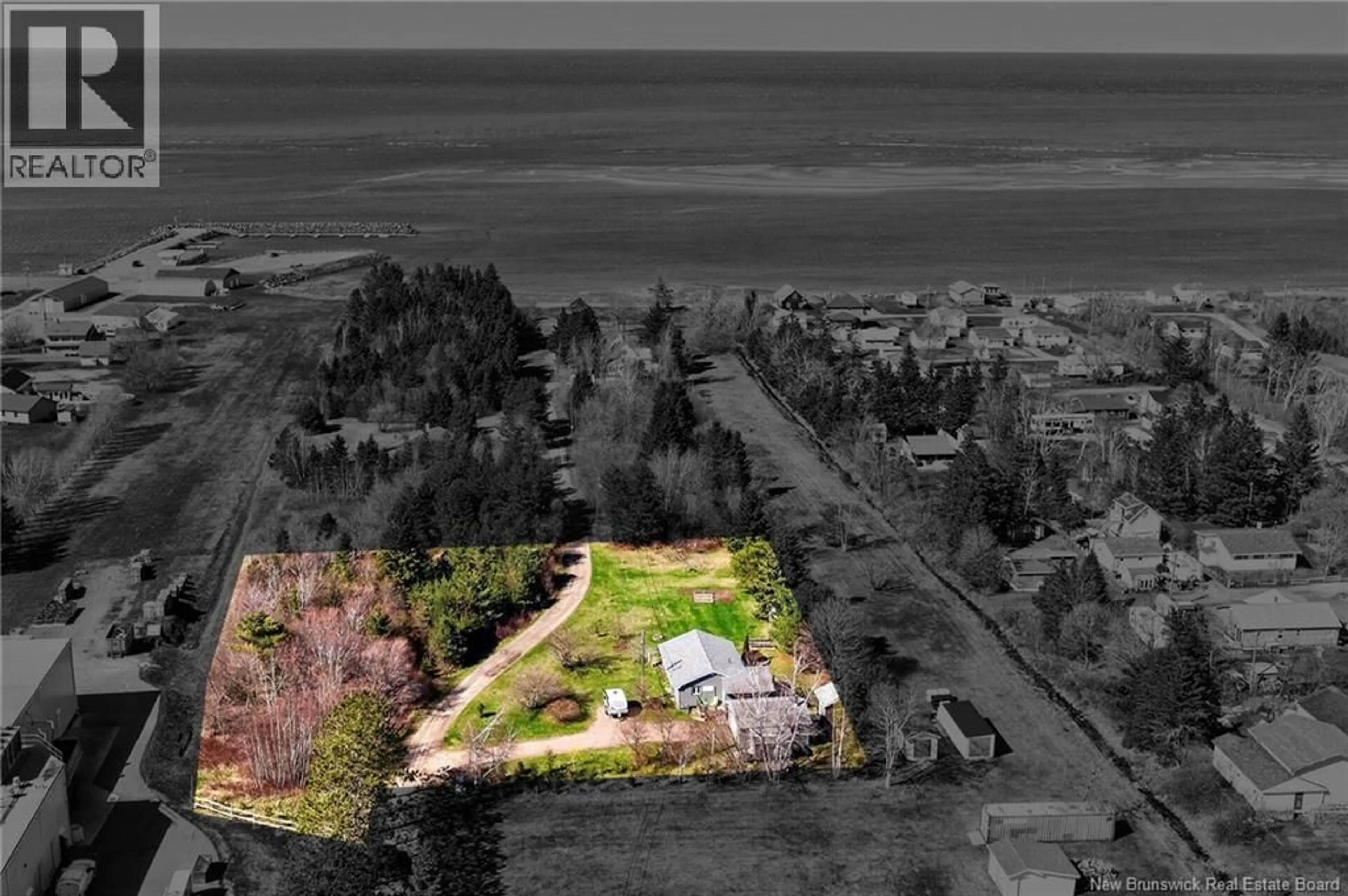 A pic from outside/outdoor area/front of a property/back of a property/a pic from drone, water/lake/river/ocean view for 19 DES LAURIERS ROAD, Grand-Barachois New Brunswick E4P7G8