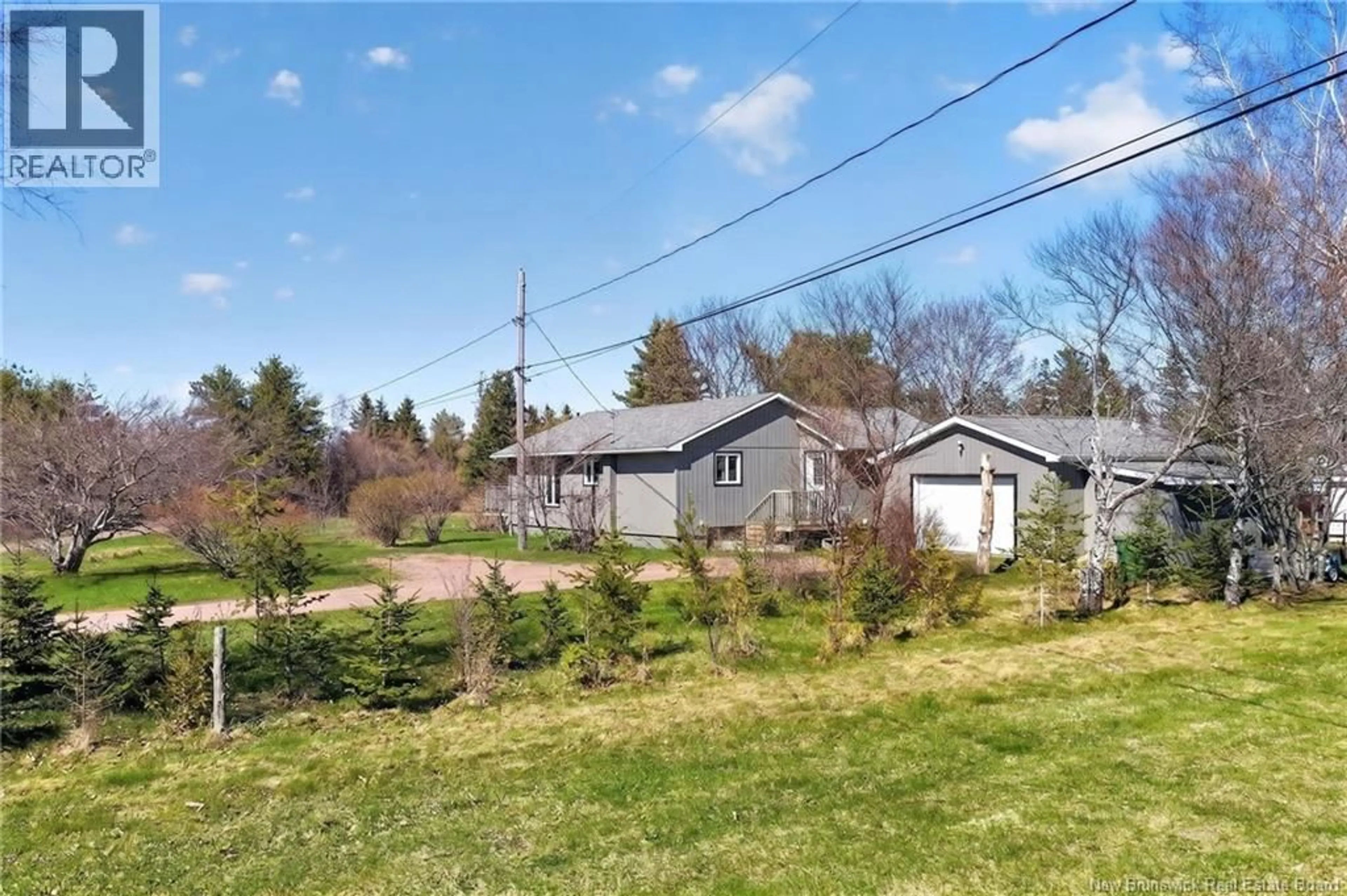 A pic from outside/outdoor area/front of a property/back of a property/a pic from drone, street for 19 DES LAURIERS ROAD, Grand-Barachois New Brunswick E4P7G8