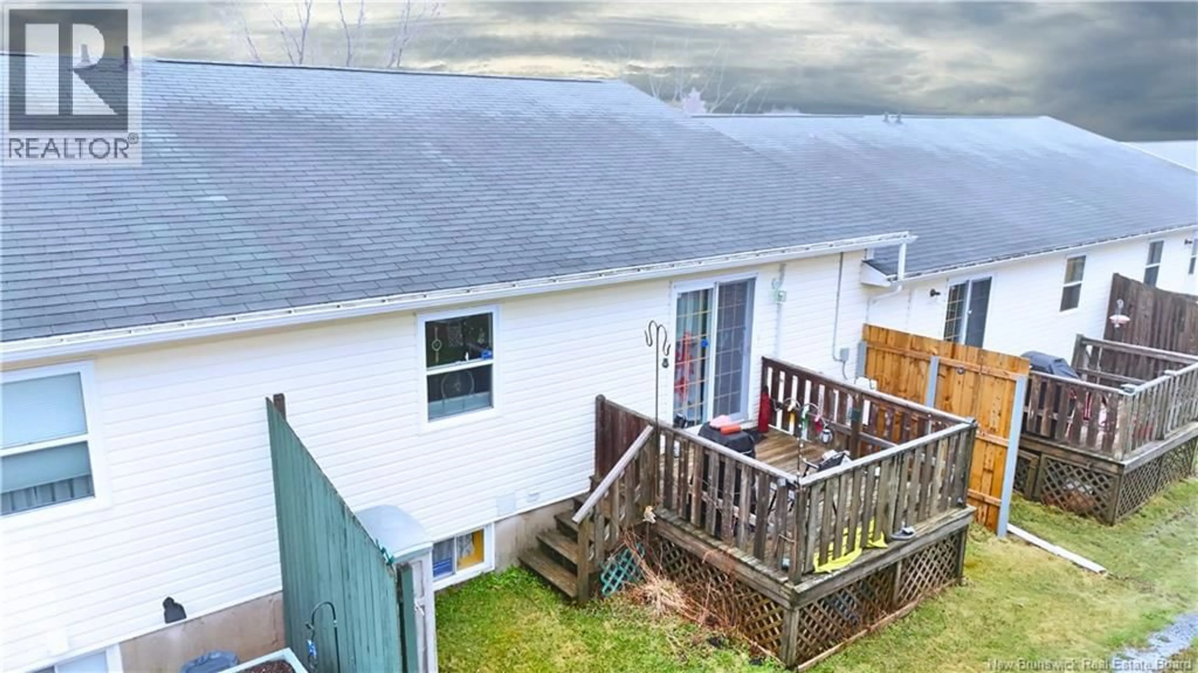 A pic from outside/outdoor area/front of a property/back of a property/a pic from drone, water/lake/river/ocean view for 23 MEADOW WOOD GARDENS, Saint John New Brunswick E2M5T1