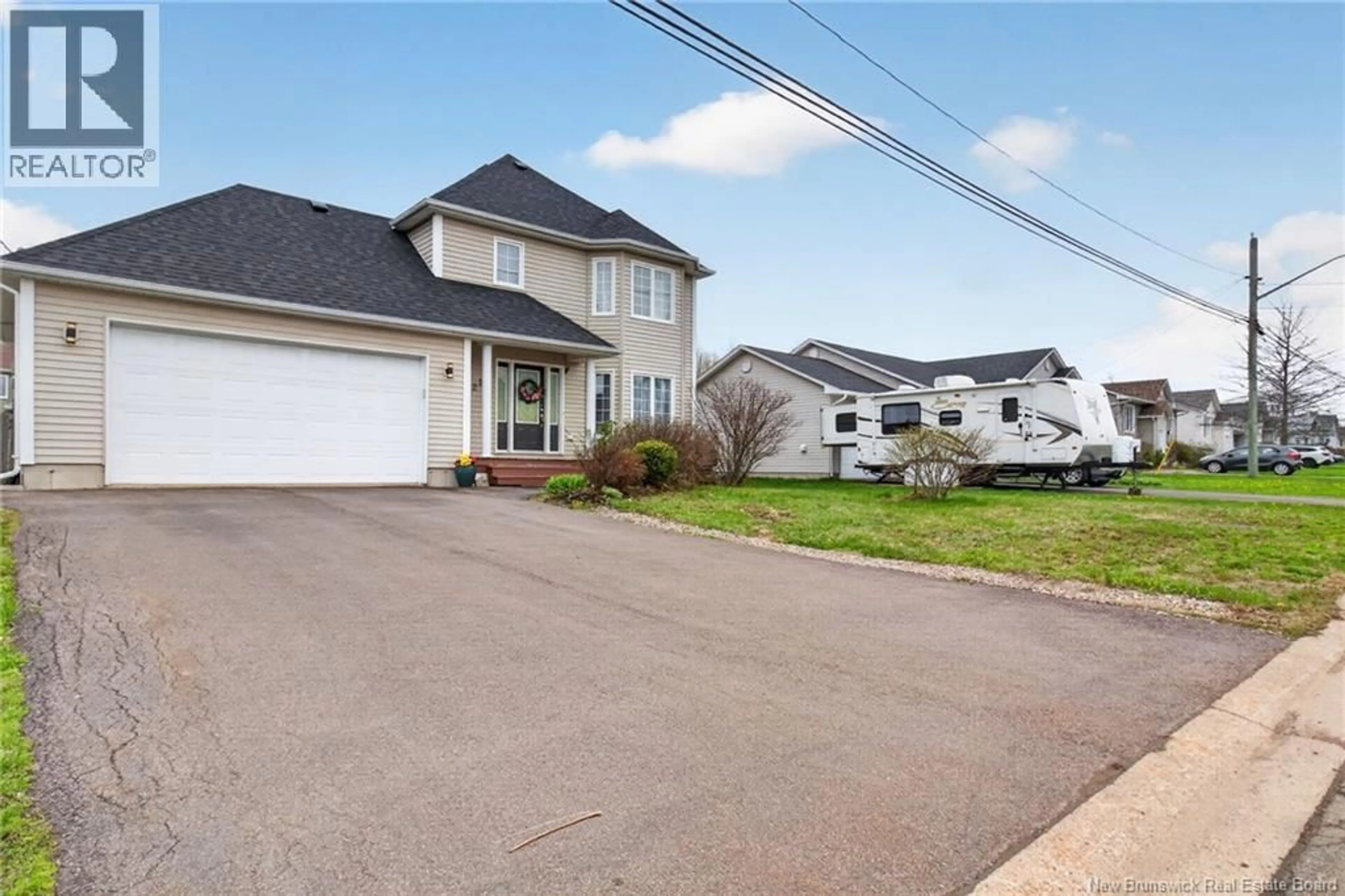 Home with vinyl exterior material, street for 228 RENNICK ROAD, Moncton New Brunswick E1G4Y1