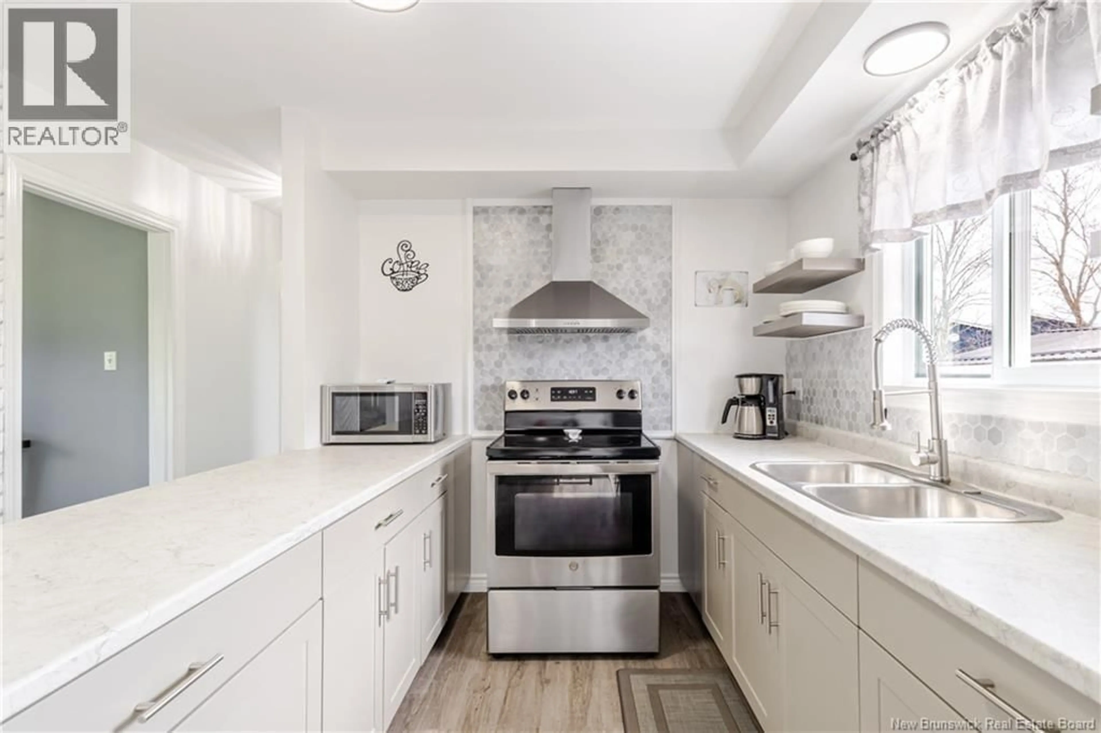 Open concept kitchen, ceramic/tile floor for 14 PUGSLEY STREET, Nackawic New Brunswick E6G1B2