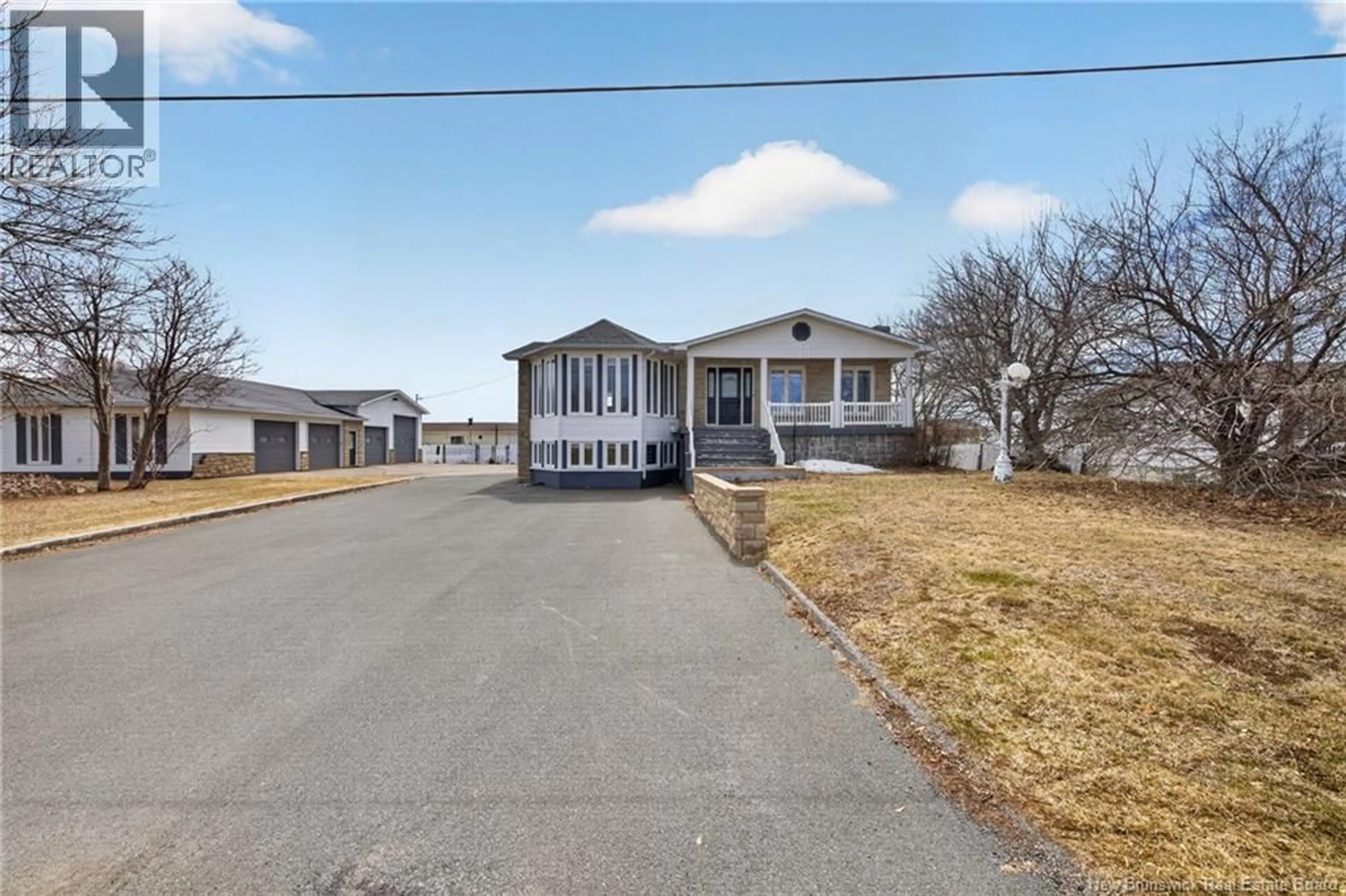 A pic from outside/outdoor area/front of a property/back of a property/a pic from drone, street for 16 RUE DU RIVAGE, Lamèque New Brunswick E8T1L5