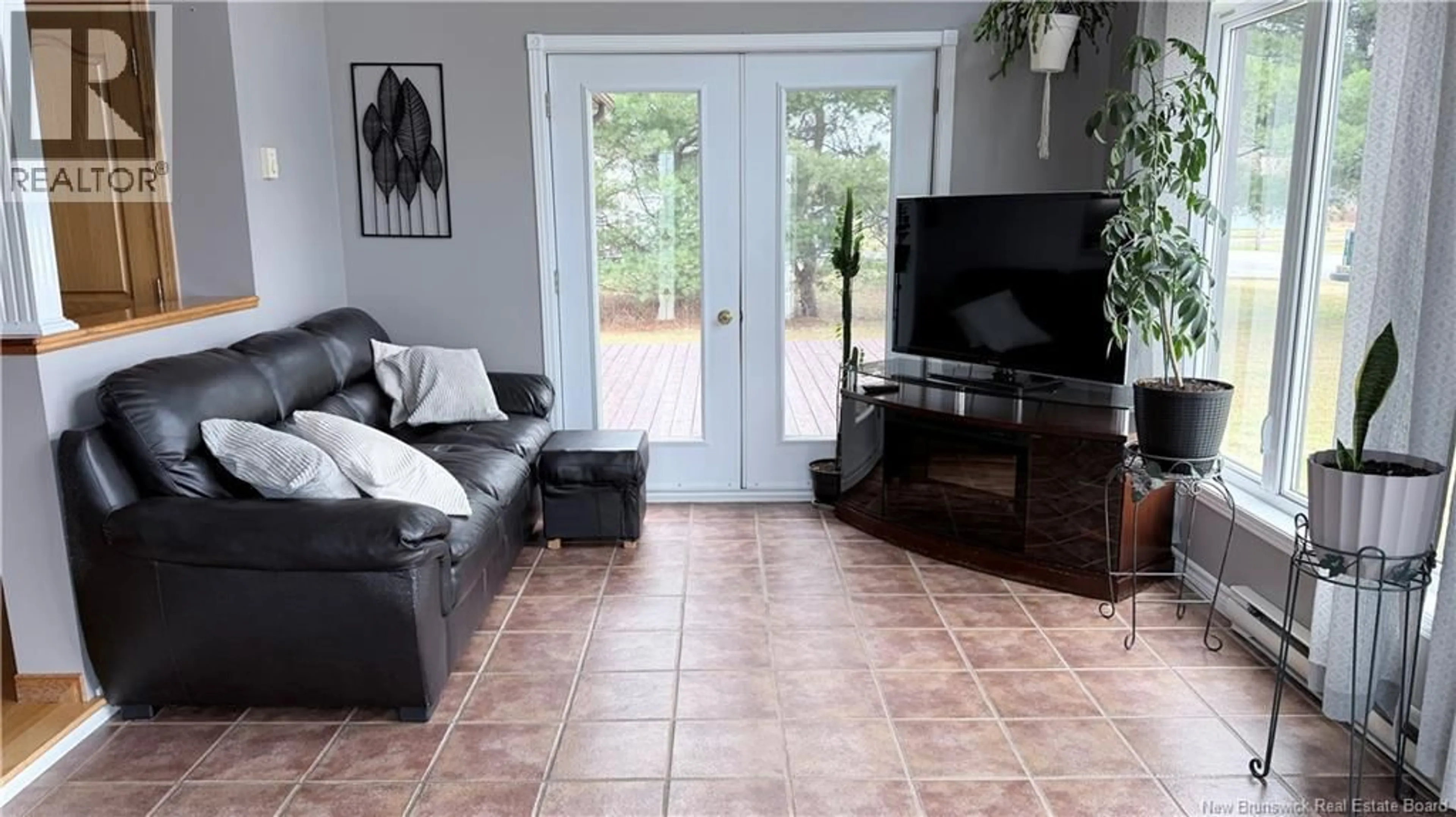 Living room with furniture, ceramic/tile floor for 3046 ROUTE 205, Saint-François-de-Madawaska New Brunswick E7A1R6