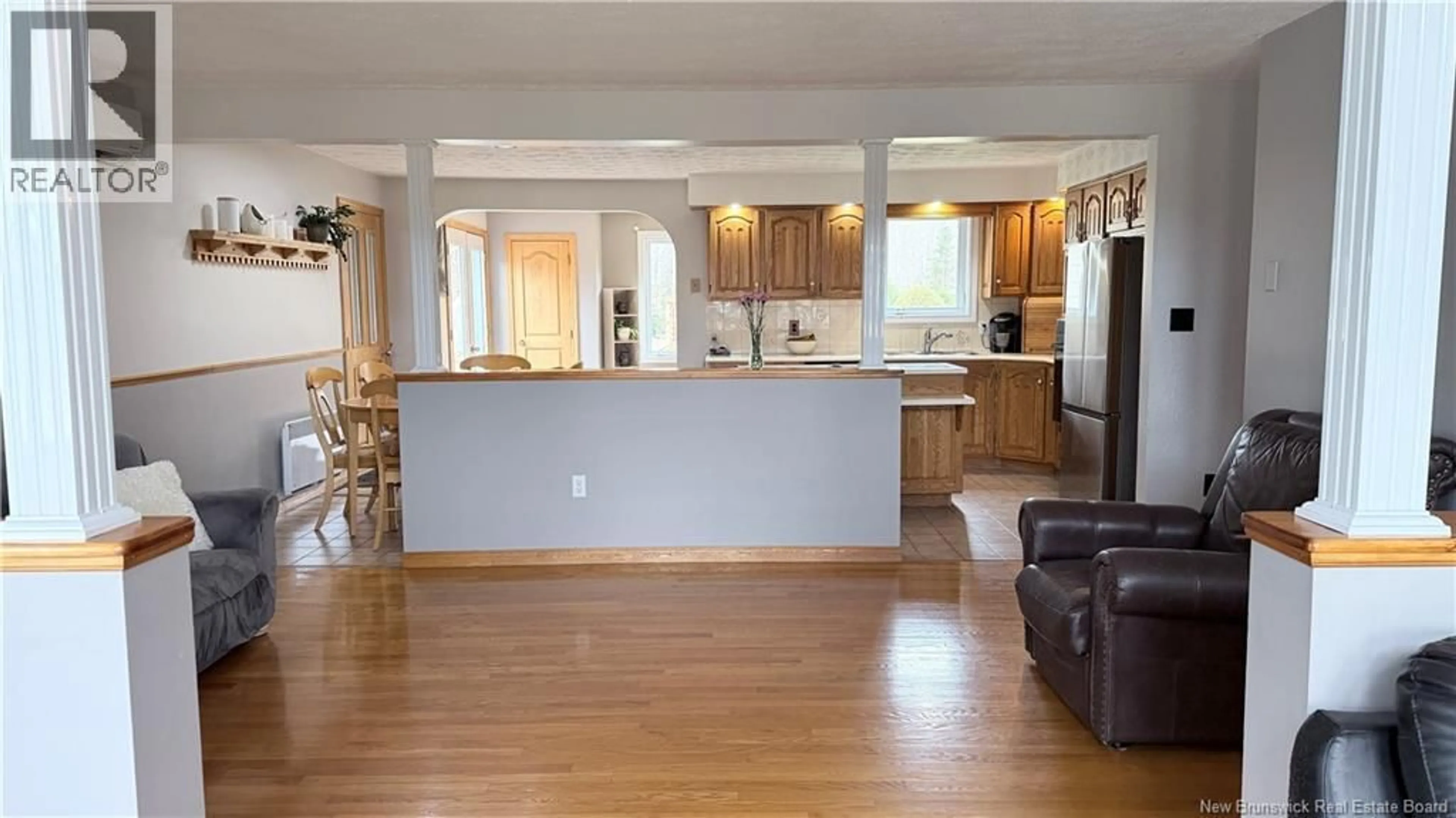 Open concept kitchen, wood/laminate floor for 3046 ROUTE 205, Saint-François-de-Madawaska New Brunswick E7A1R6