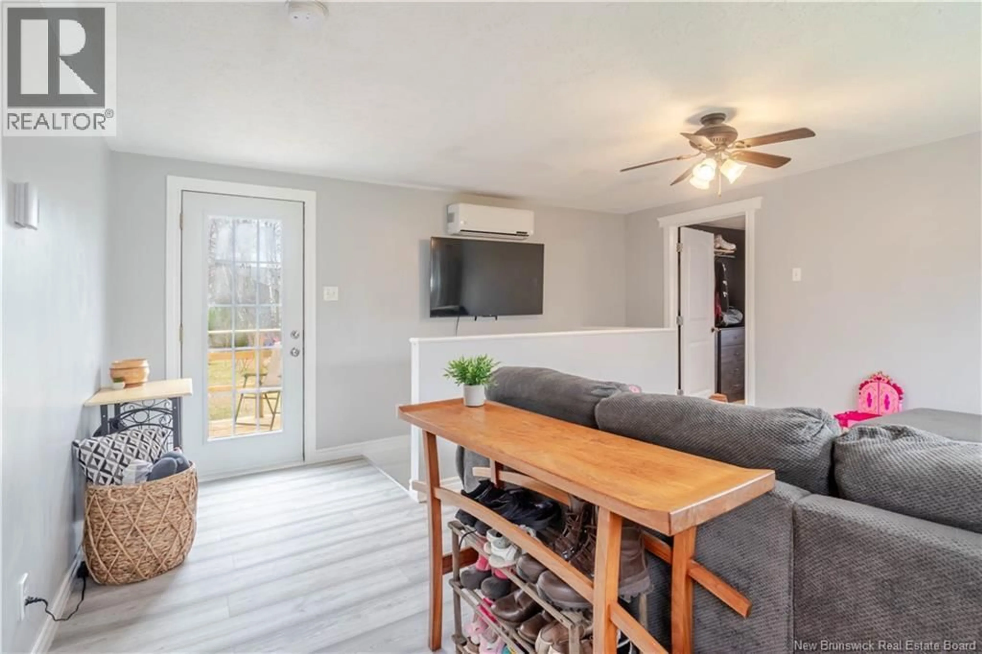 Living room with furniture, unknown for 9 MCLEOD LANE, Lincoln New Brunswick E3B8S1