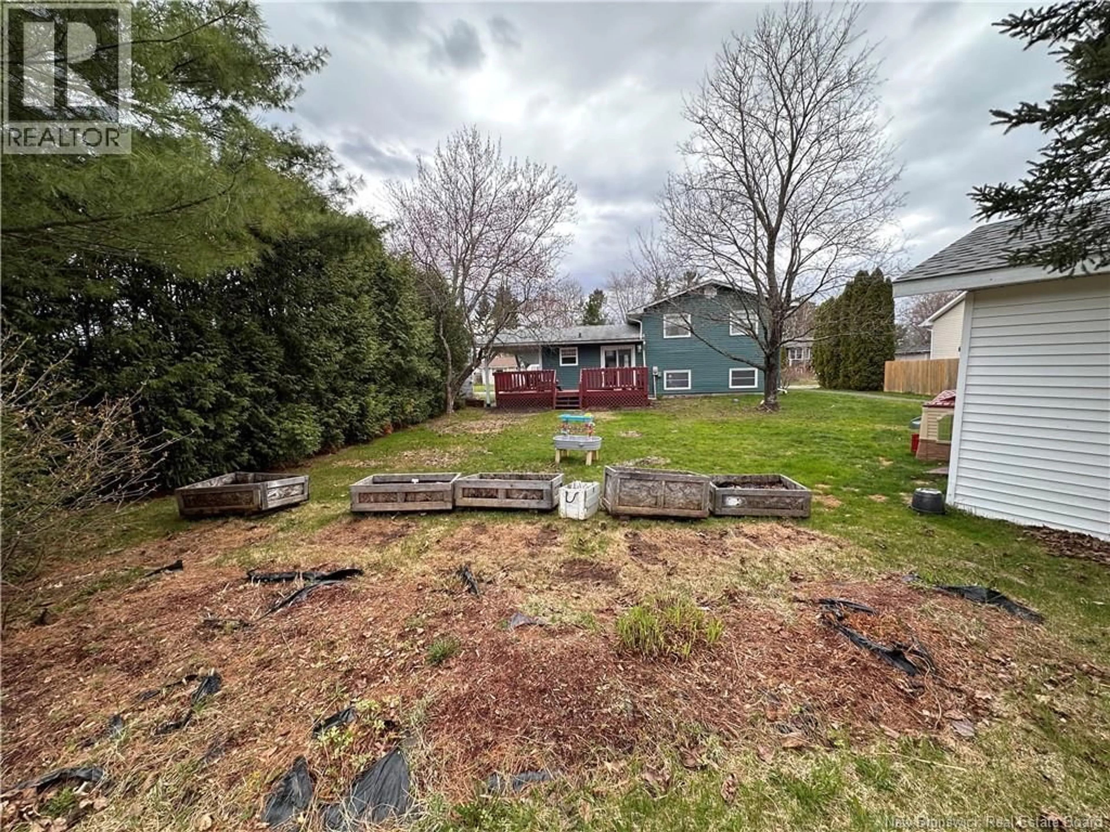 A pic from outside/outdoor area/front of a property/back of a property/a pic from drone, street for 23 BARKER STREET, Oromocto New Brunswick E2V2K4