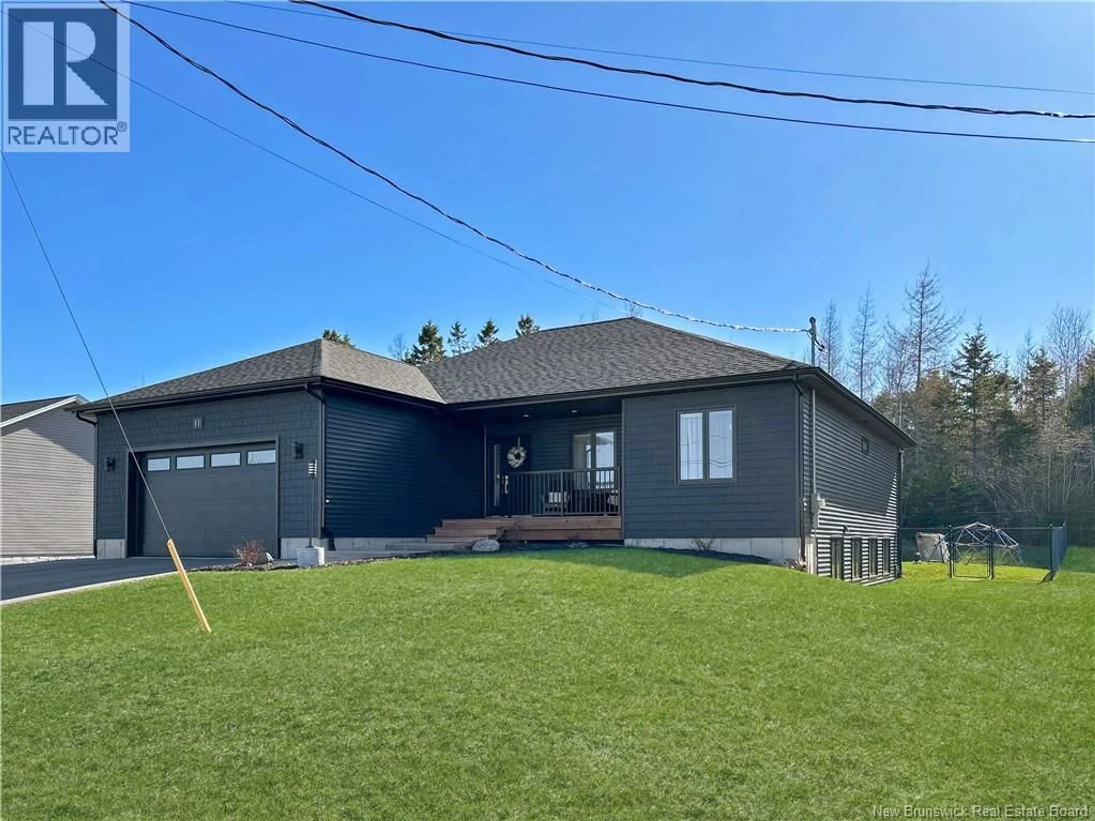 A pic from outside/outdoor area/front of a property/back of a property/a pic from drone, street for 11 ORIOLE LANE, Quispamsis New Brunswick E2E0S6
