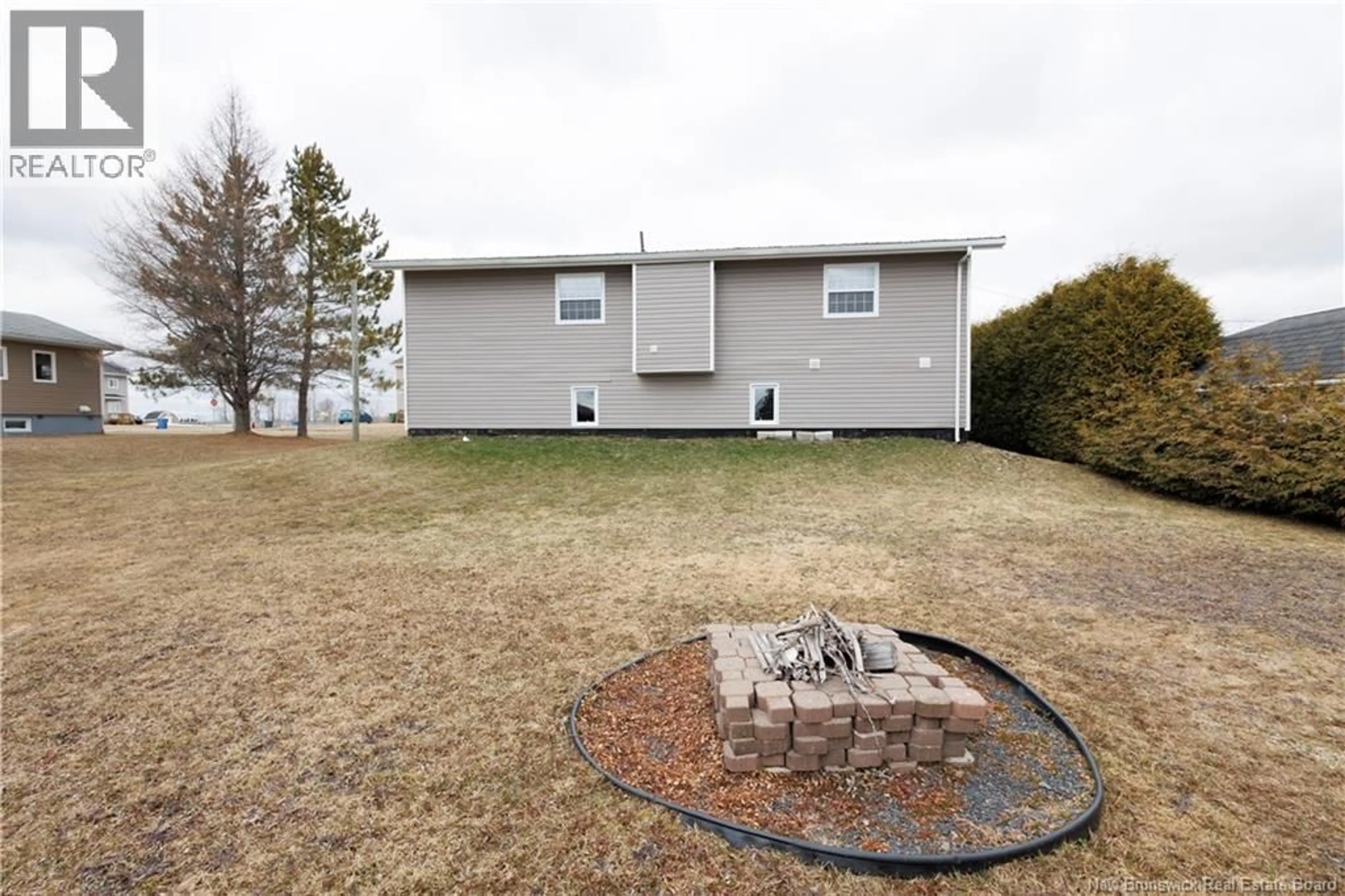 A pic from outside/outdoor area/front of a property/back of a property/a pic from drone, water/lake/river/ocean view for 408 POITRAS STREET, Saint-André New Brunswick E3Y3S7