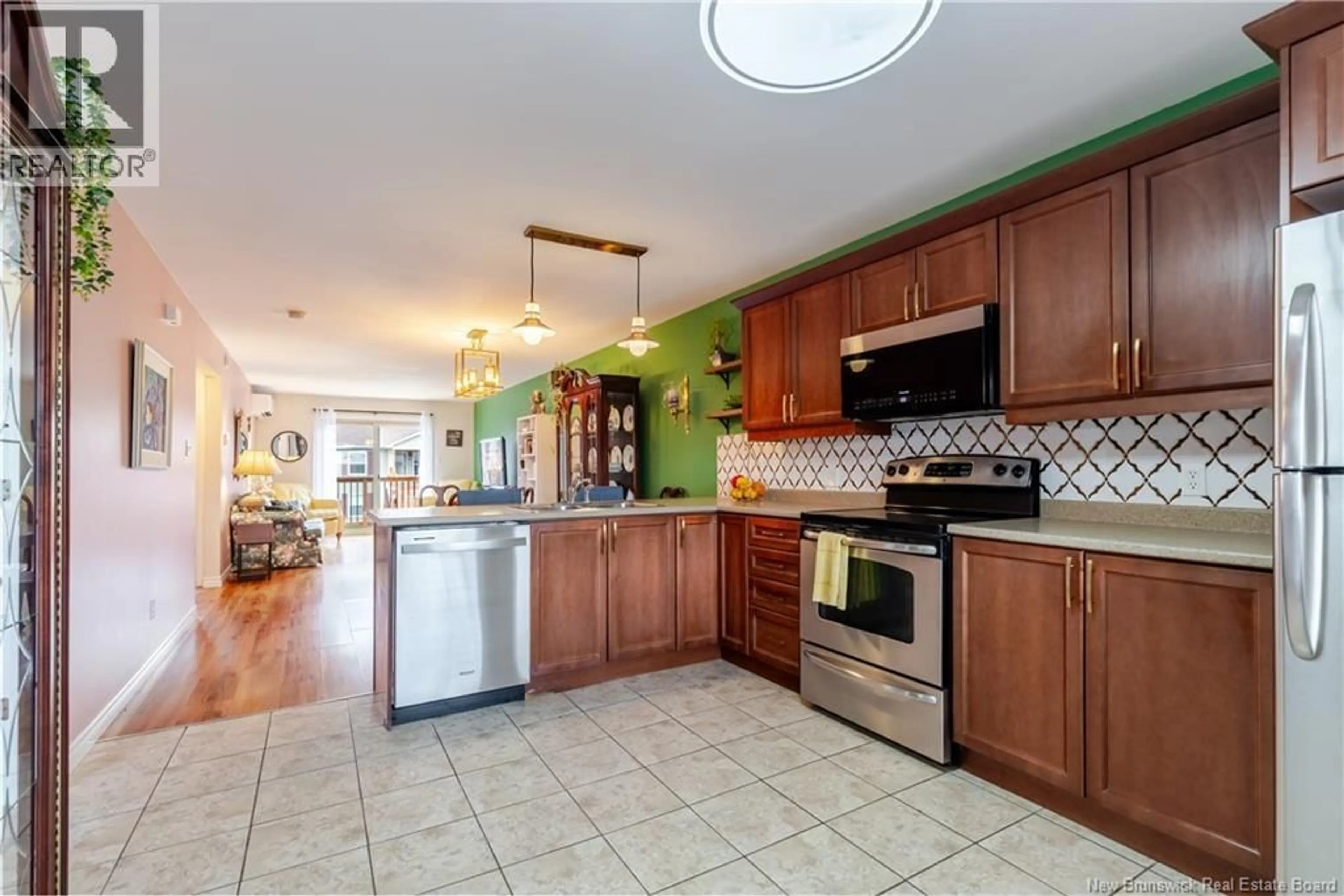 Open concept kitchen, ceramic/tile floor for 68 - 25 TRAILSIDE LANE, Fredericton New Brunswick E3A5M3