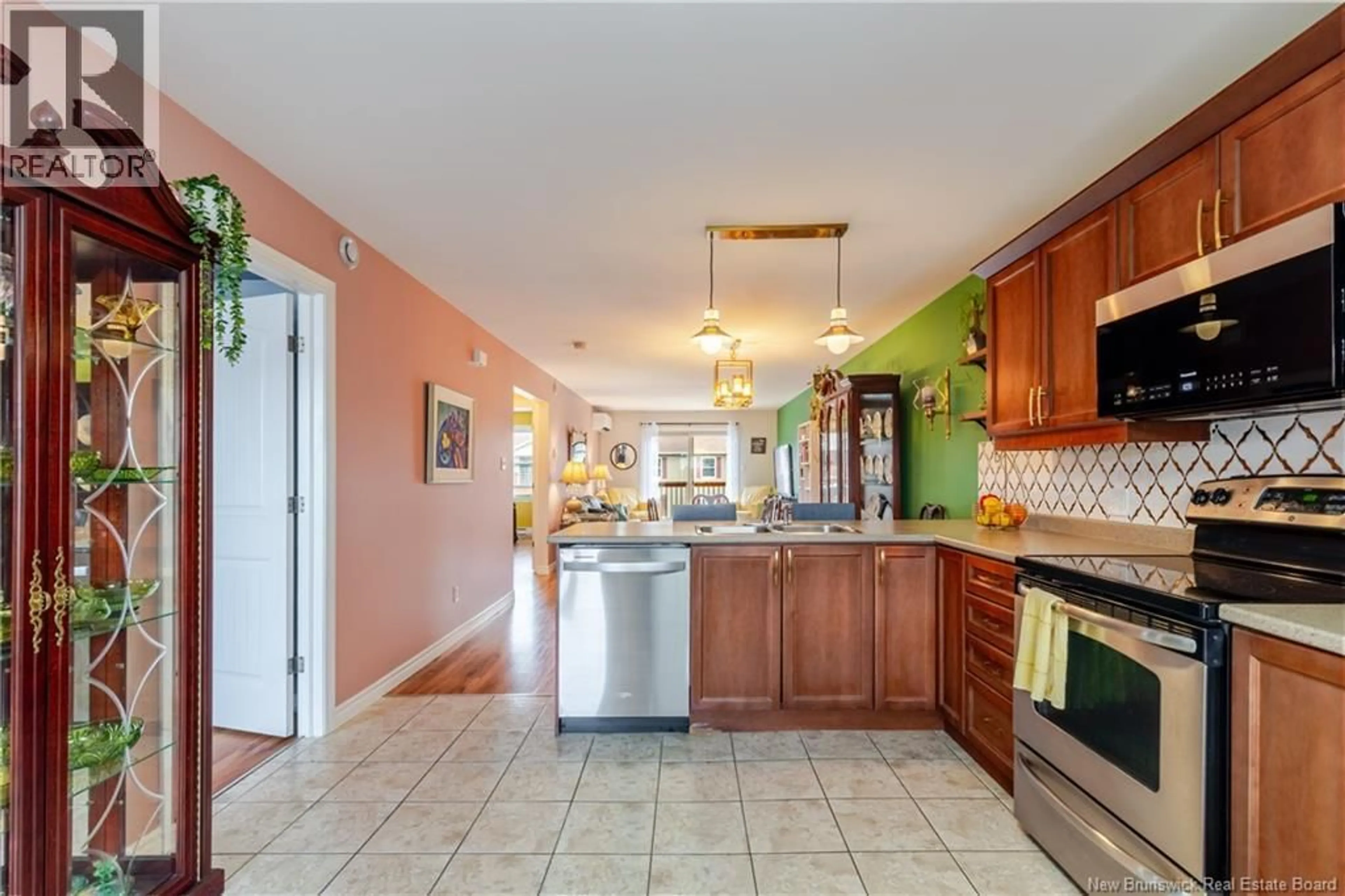 Open concept kitchen, ceramic/tile floor for 68 - 25 TRAILSIDE LANE, Fredericton New Brunswick E3A5M3