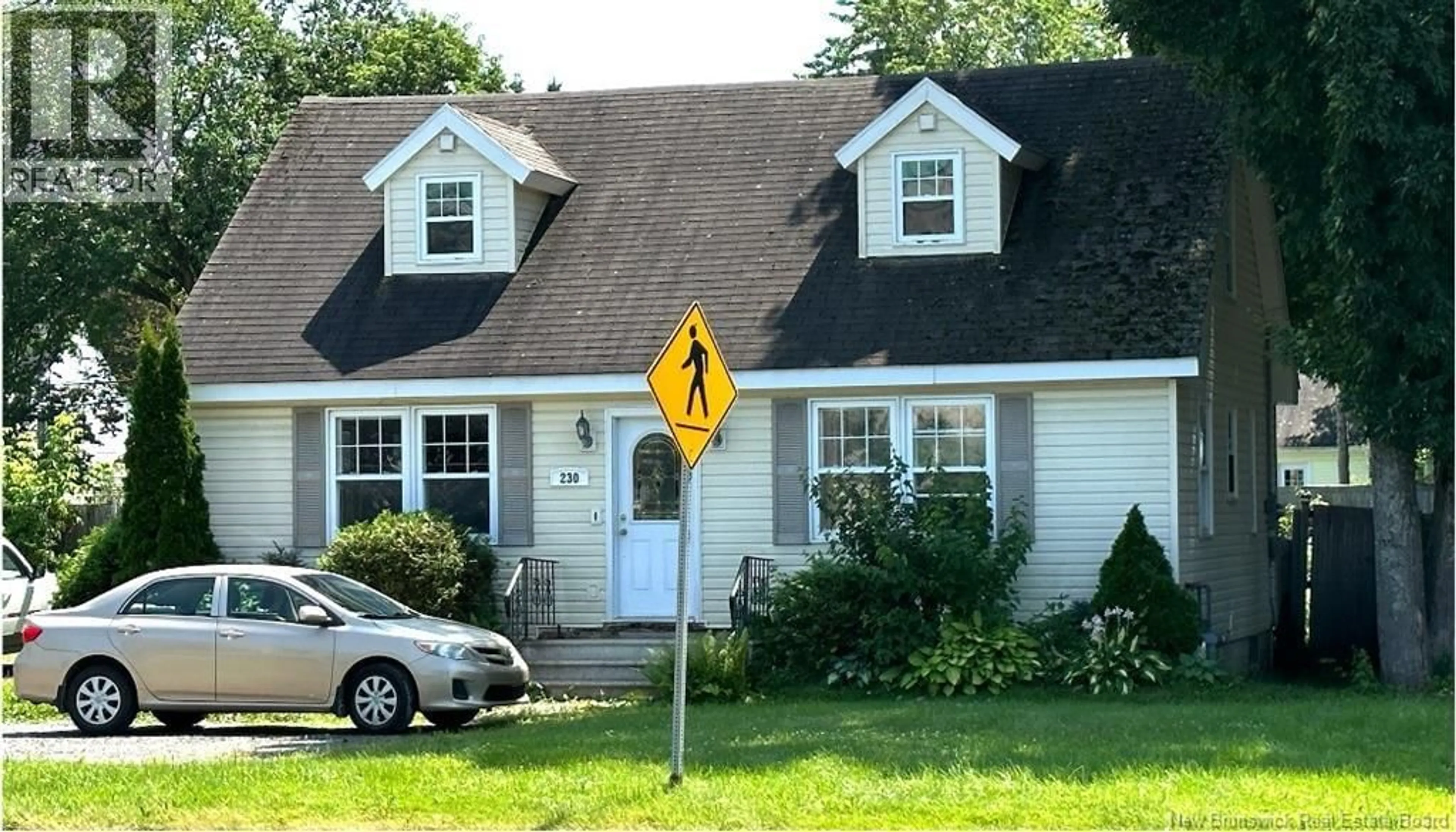 Home with vinyl exterior material, street for 230 WOODSTOCK ROAD, Fredericton New Brunswick E3B2H7