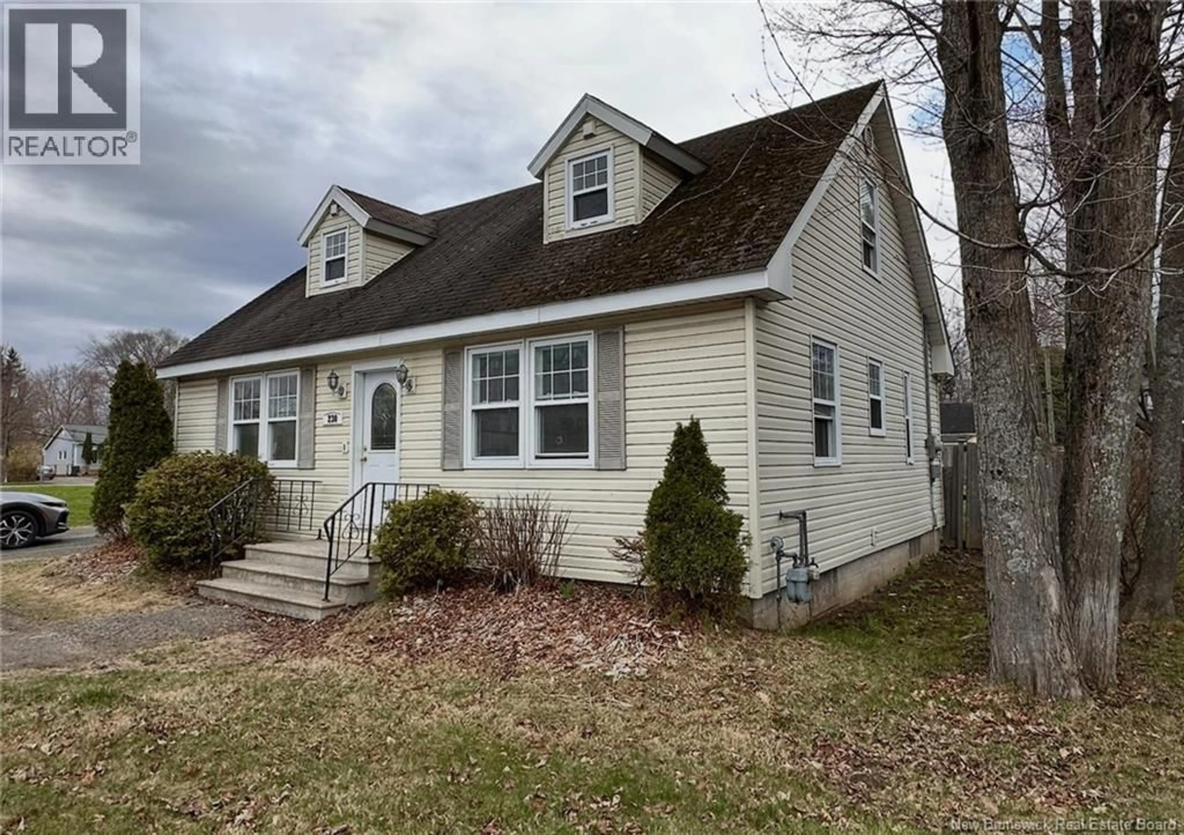 Home with vinyl exterior material, street for 230 WOODSTOCK ROAD, Fredericton New Brunswick E3B2H7