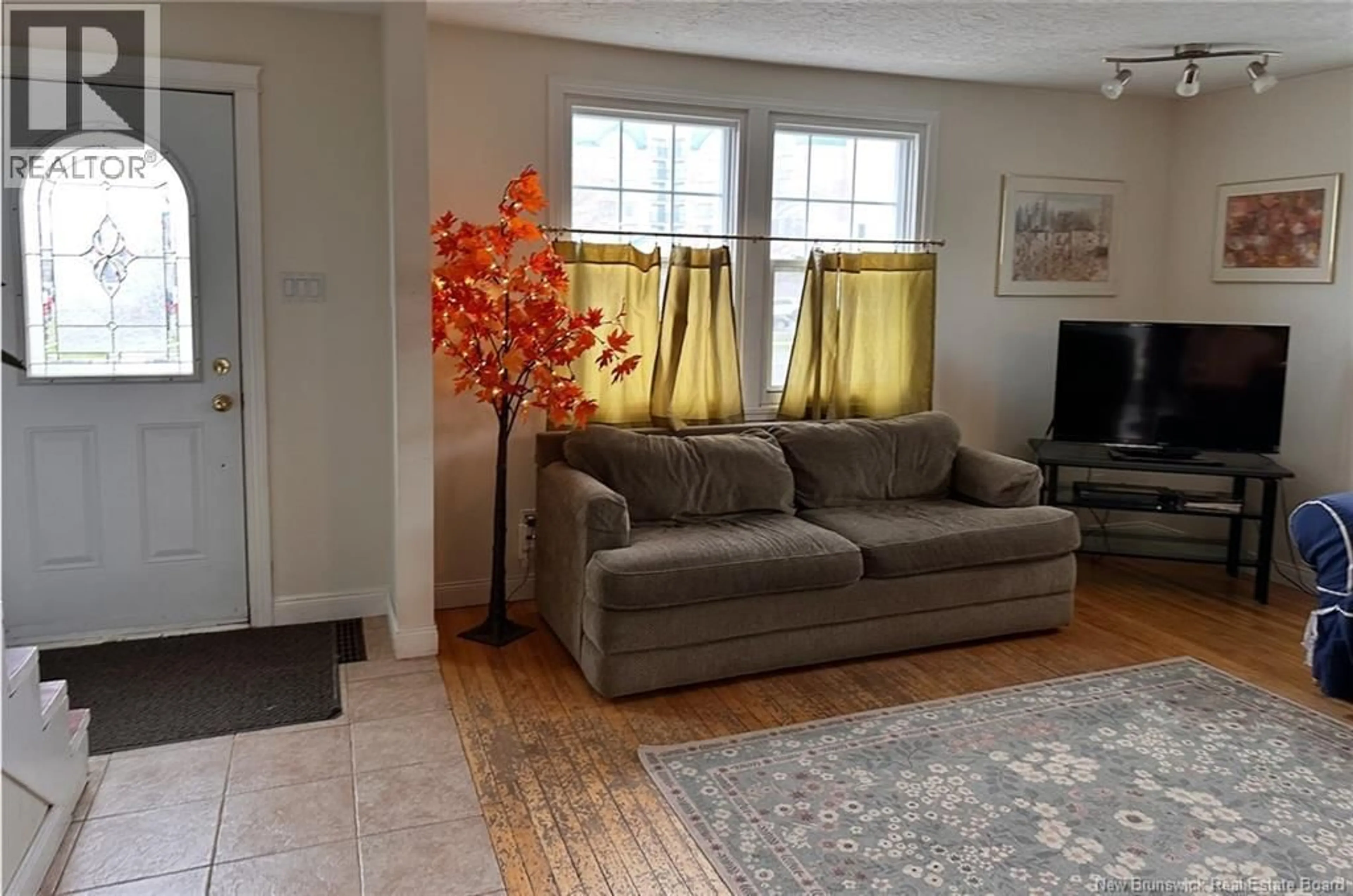 Living room with furniture, unknown for 230 WOODSTOCK ROAD, Fredericton New Brunswick E3B2H7