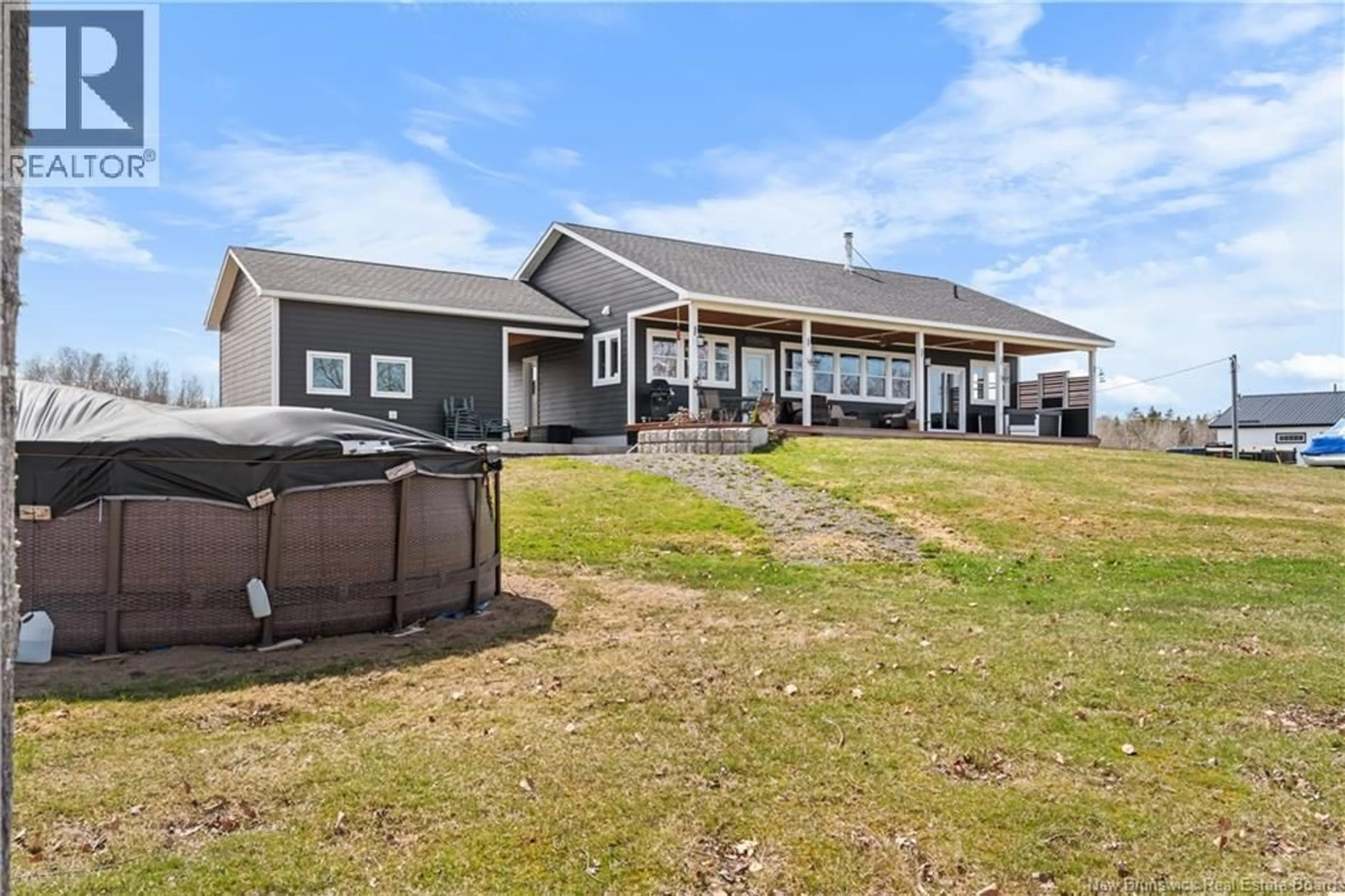 A pic from outside/outdoor area/front of a property/back of a property/a pic from drone, water/lake/river/ocean view for 22 DOUGLAS LANE, Bass River New Brunswick E4T0E4
