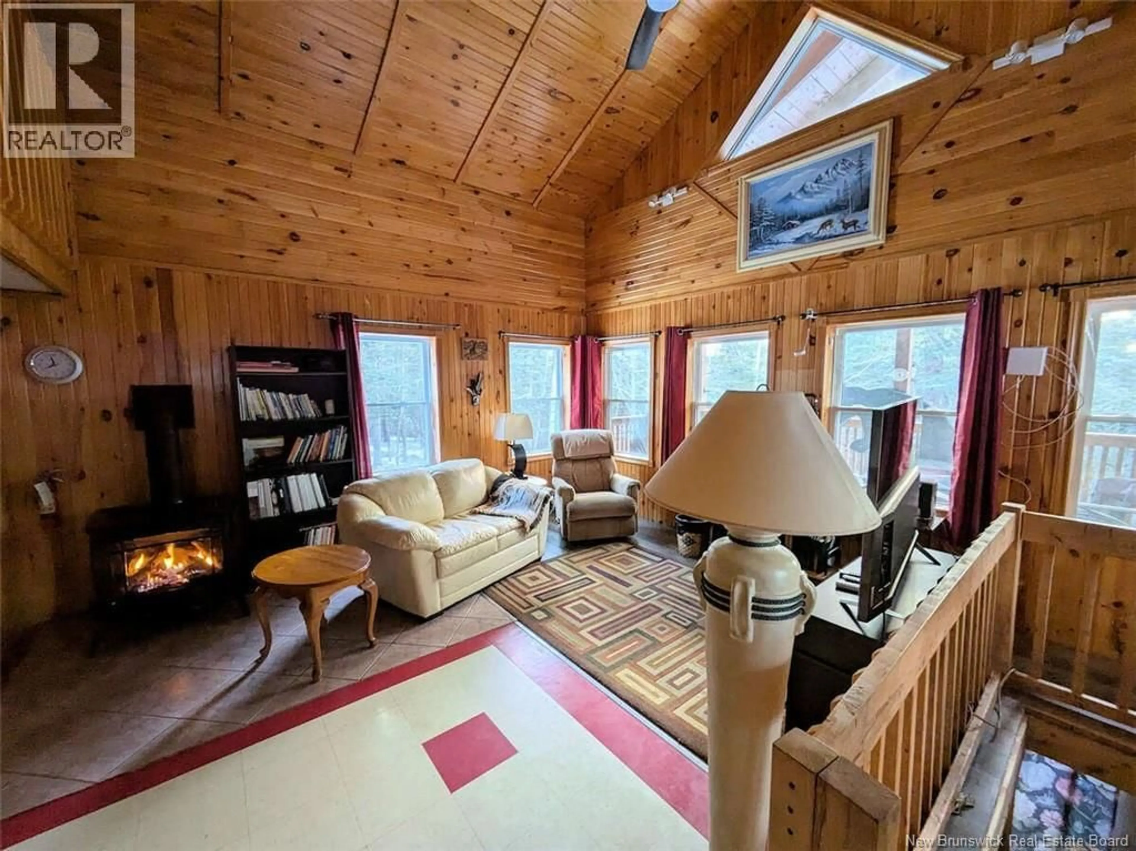 Living room with furniture, wood/laminate floor for 597 BIRCH RIDGE ROAD, Arthurette New Brunswick E7H1L6