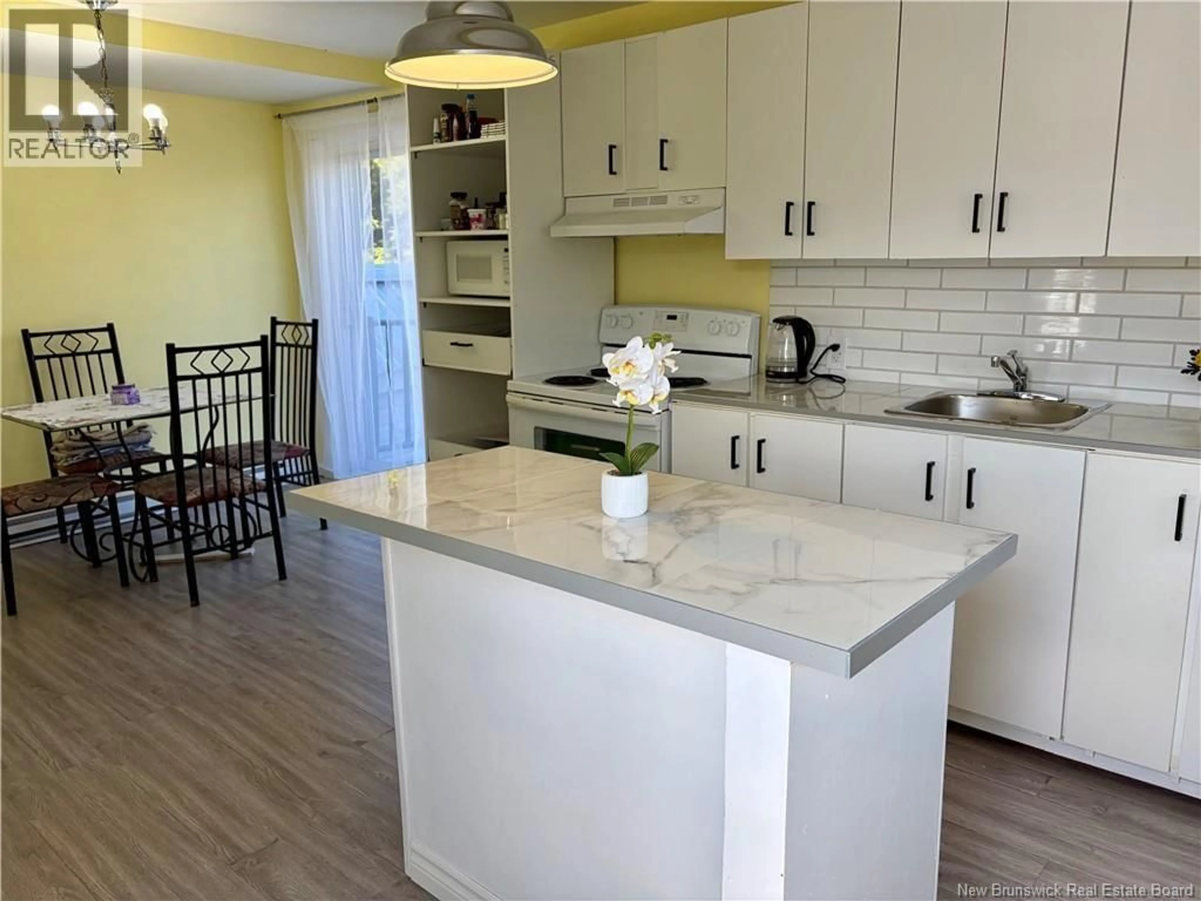 Open concept kitchen, unknown for 453 CHALEUR, Charlo New Brunswick E8E2B9