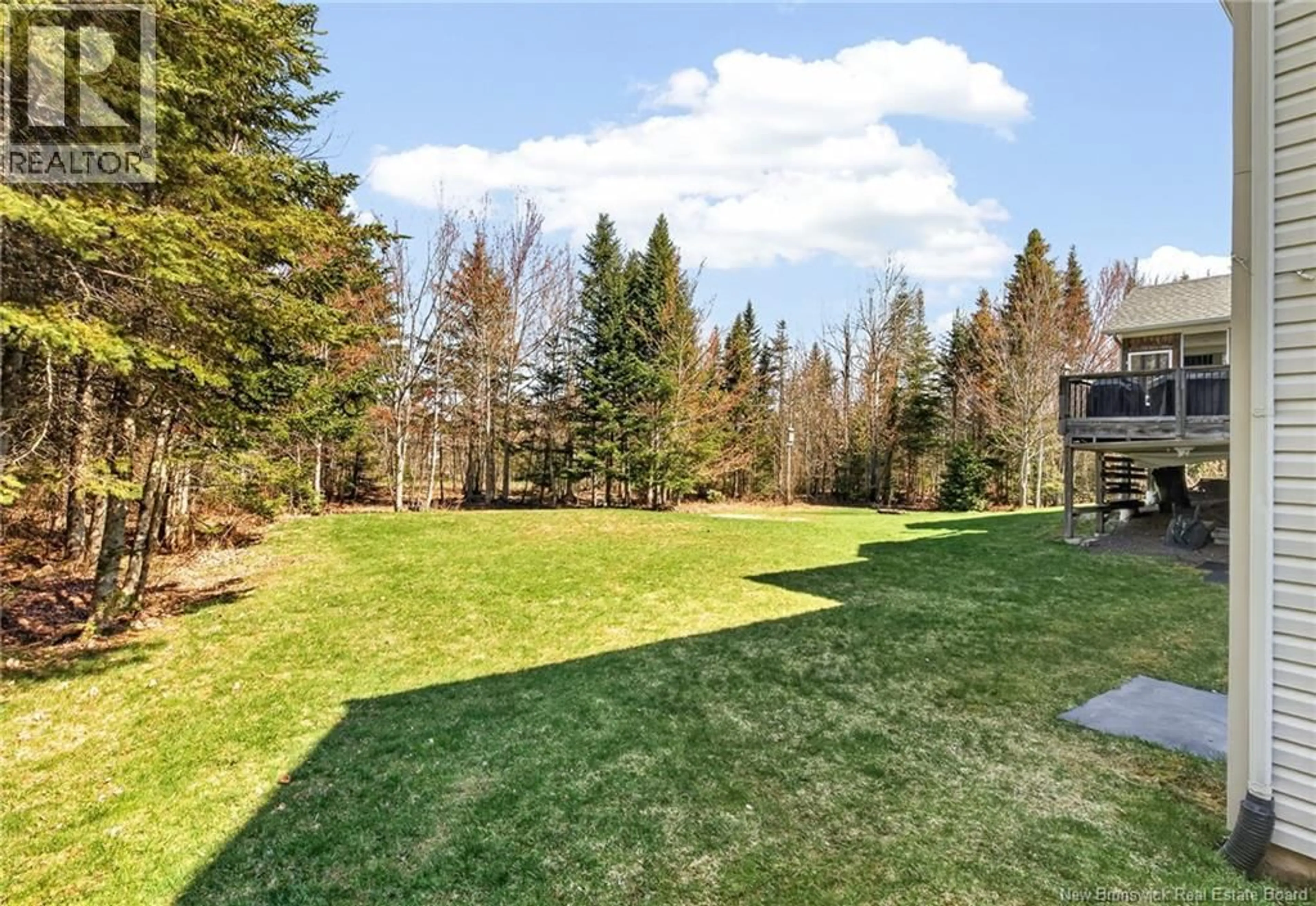 A pic from outside/outdoor area/front of a property/back of a property/a pic from drone, forest/trees view for 59 LAFONTAINE DRIVE, Dieppe New Brunswick E1H0C1