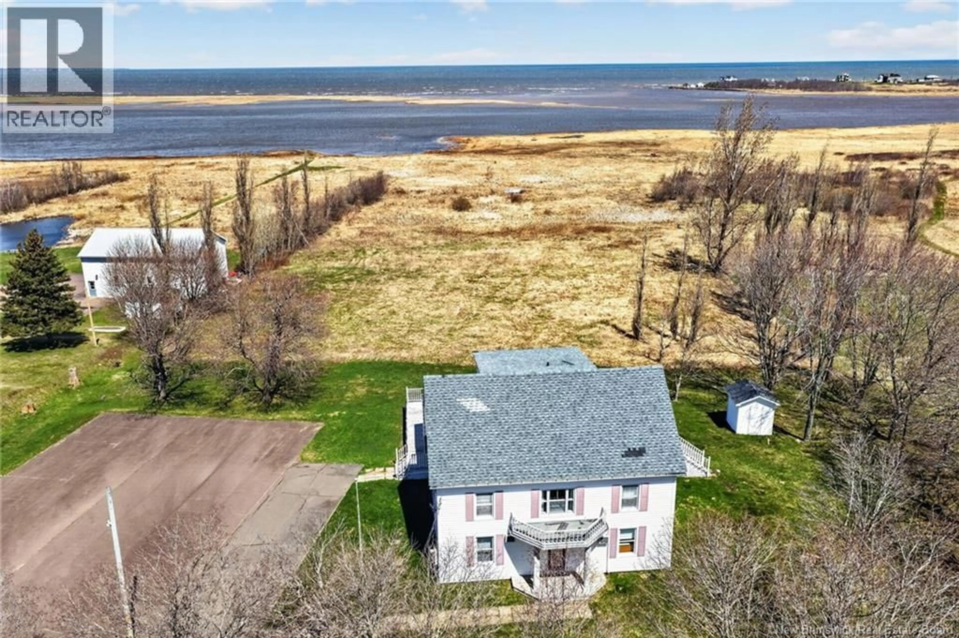 A pic from outside/outdoor area/front of a property/back of a property/a pic from drone, water/lake/river/ocean view for 1204 ROUTE 133, Grand-Barachois New Brunswick E4P8G4