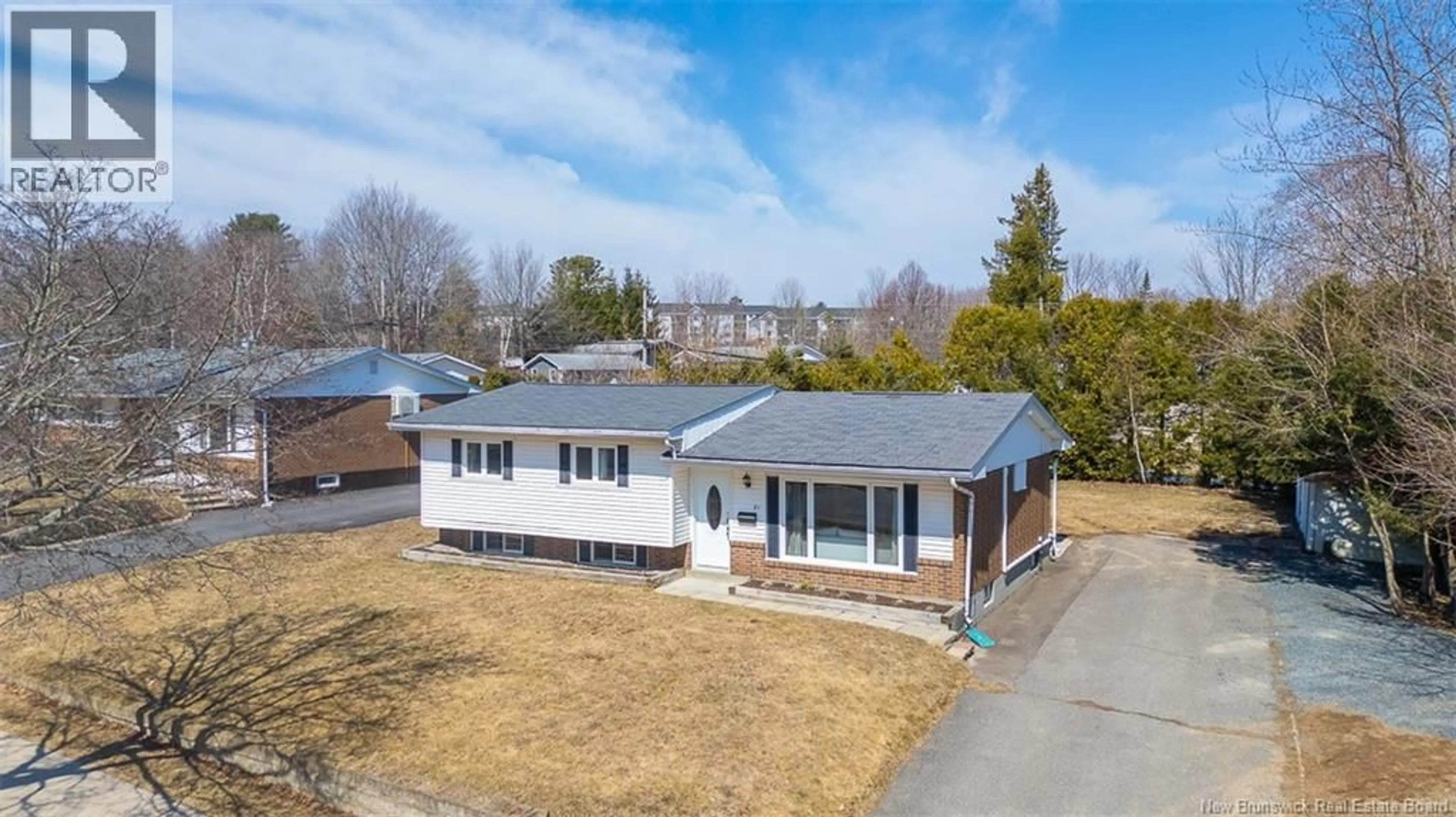 A pic from outside/outdoor area/front of a property/back of a property/a pic from drone, street for 81 MCNAIR DR, Fredericton New Brunswick E3B5J5