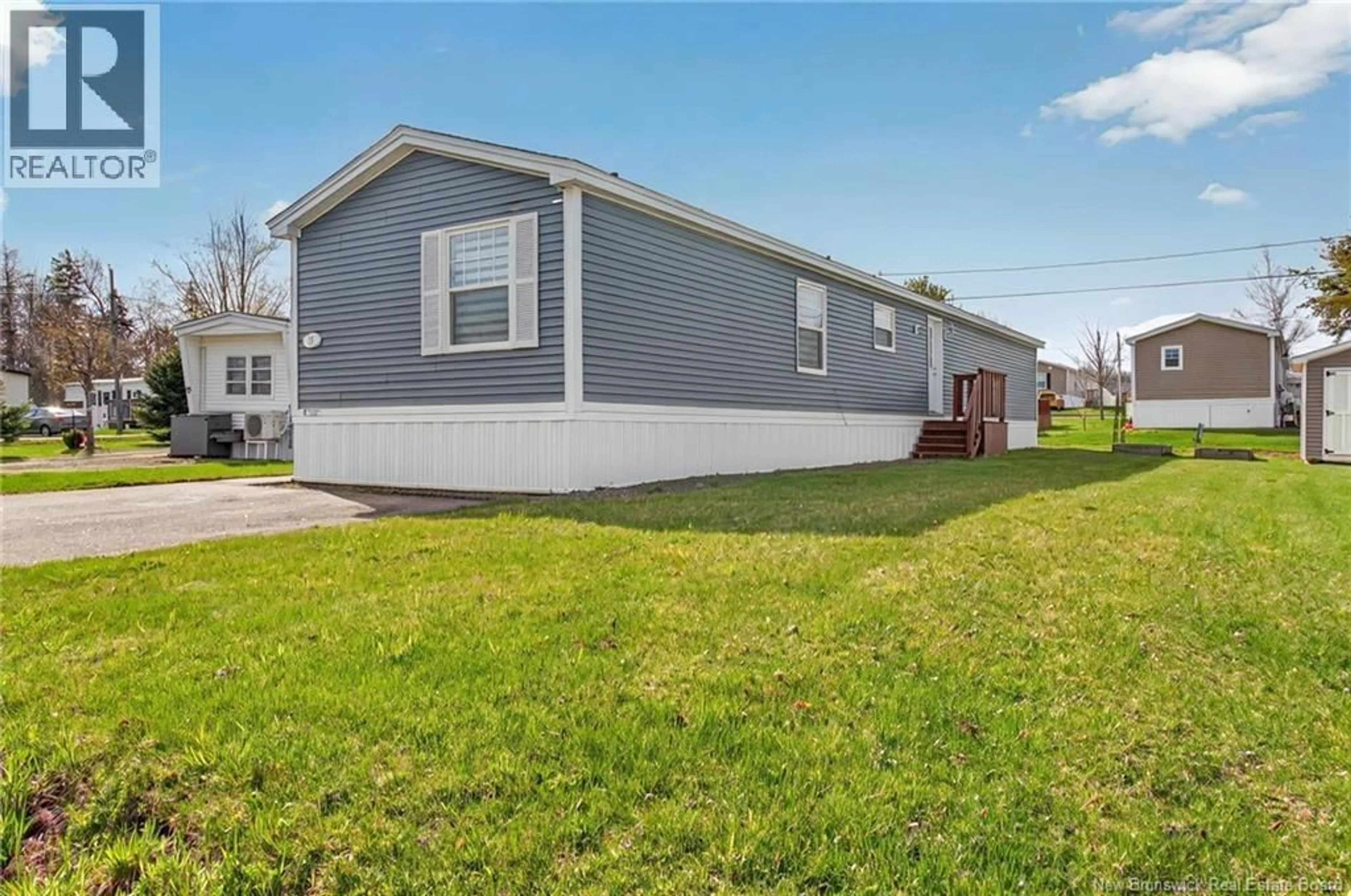 Home with vinyl exterior material, street for 57 BLOSSOM, Riverview New Brunswick E1B4Y7