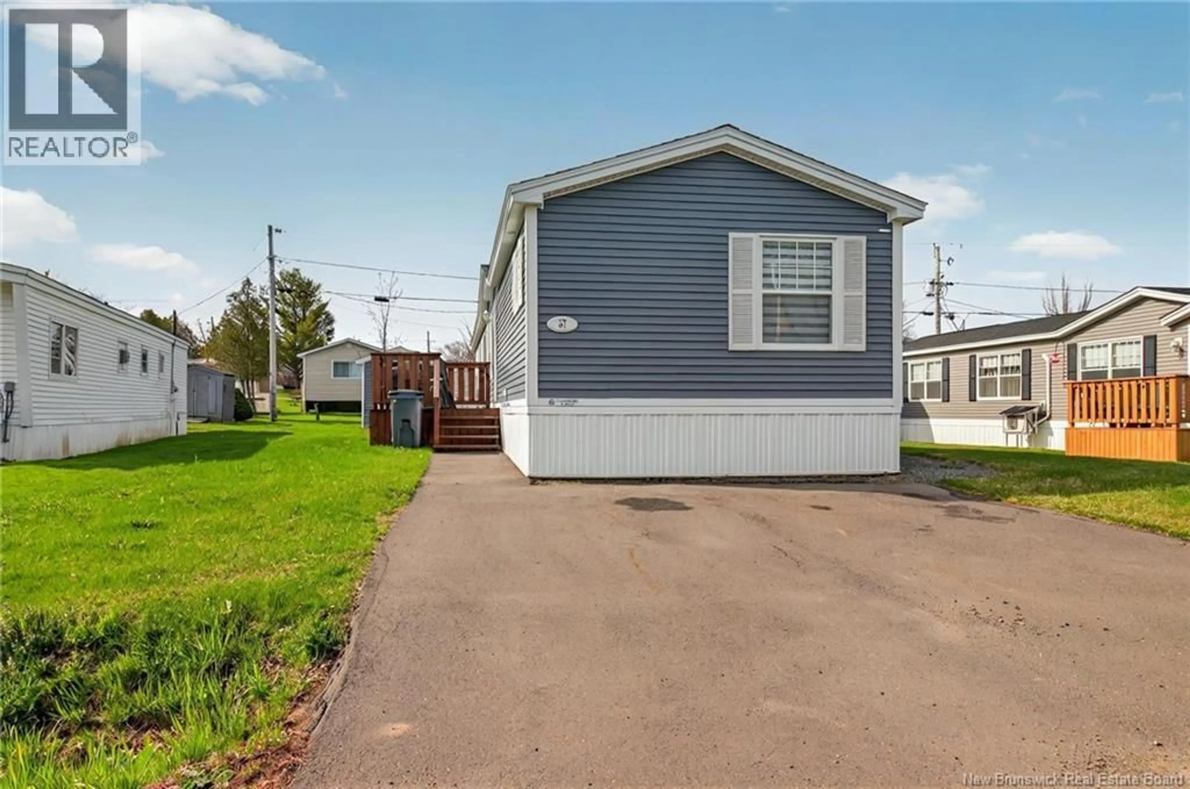 Home with vinyl exterior material, street for 57 BLOSSOM, Riverview New Brunswick E1B4Y7