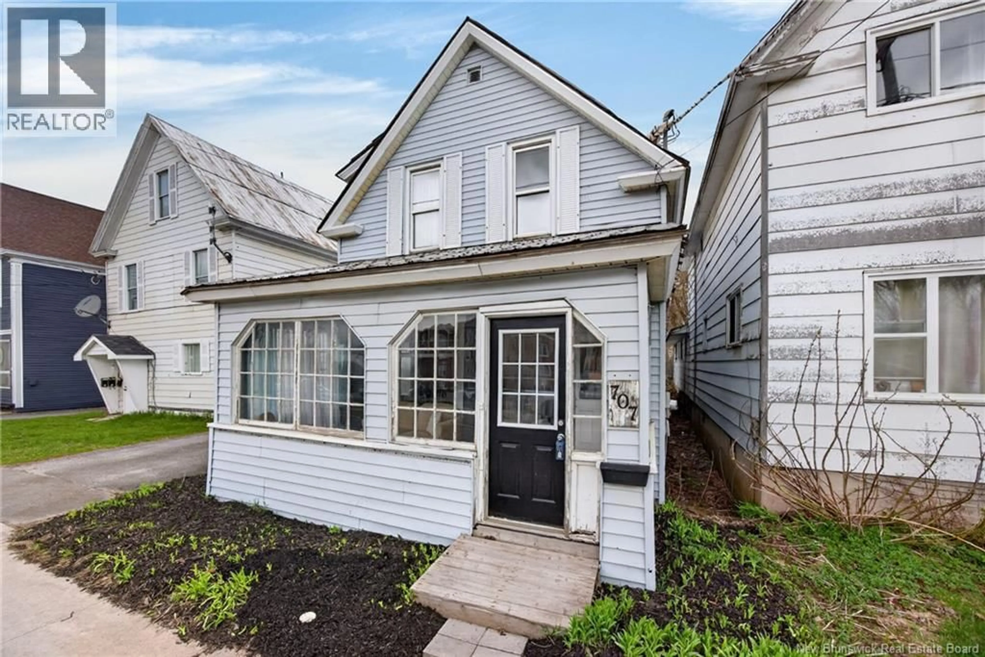 Home with vinyl exterior material, street for 707 UNION, Devon New Brunswick E3A3N9