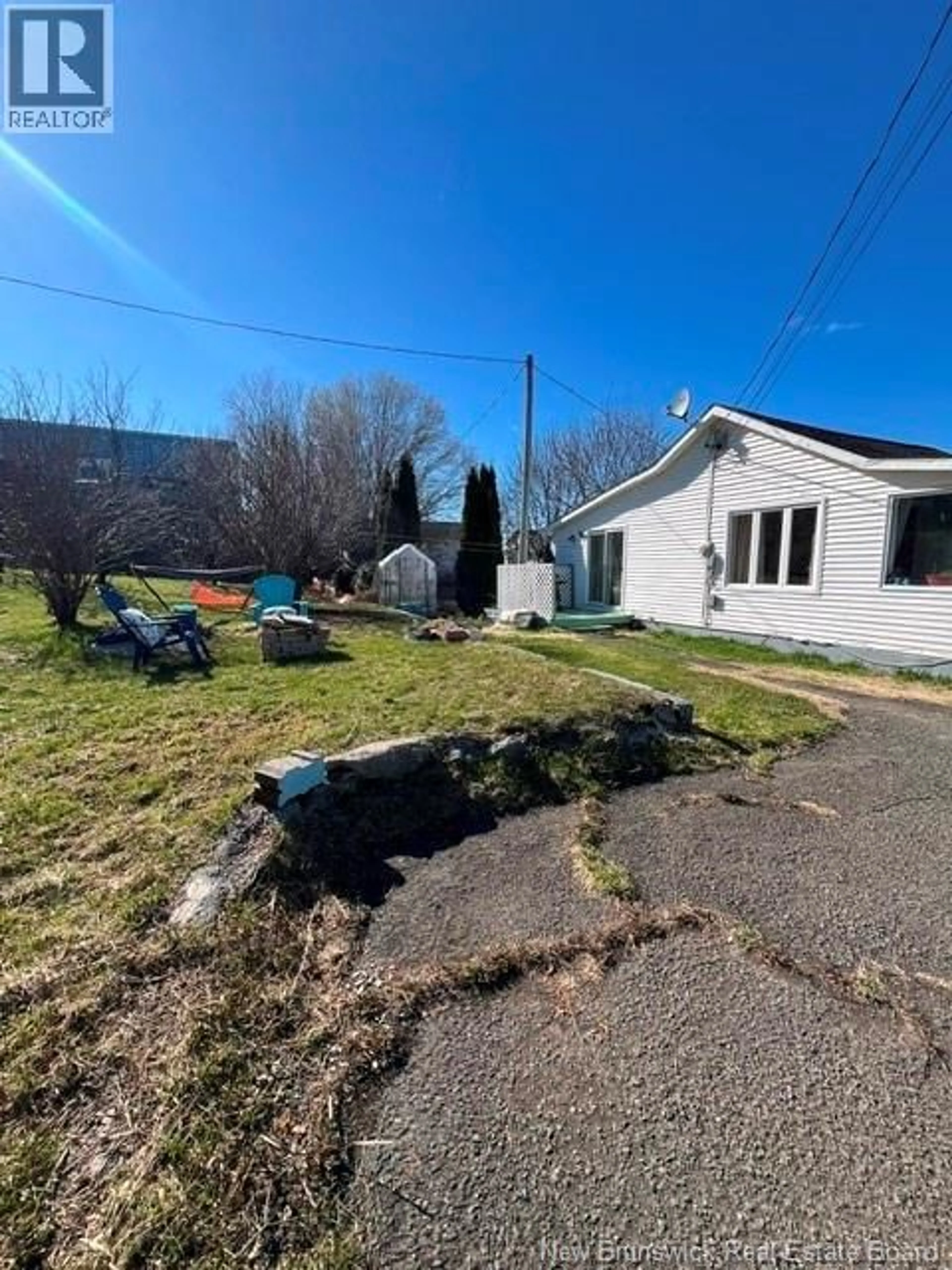 A pic from outside/outdoor area/front of a property/back of a property/a pic from drone, street for 124 BEARSE STREET, Dalhousie New Brunswick E8C1E5