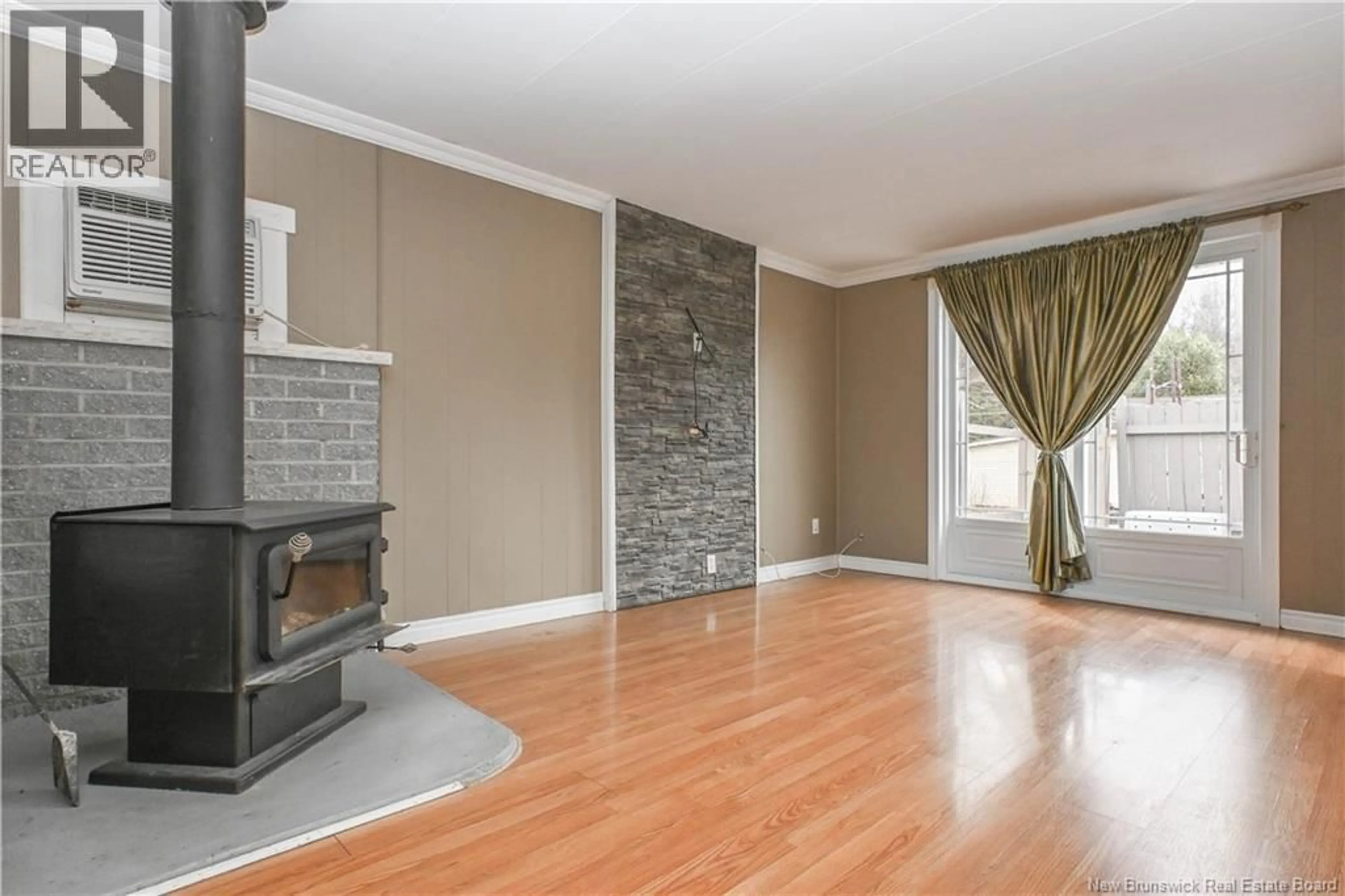 Living room with furniture, unknown for 55 DES ARBRES STREET, Le Goulet New Brunswick E8S2G5
